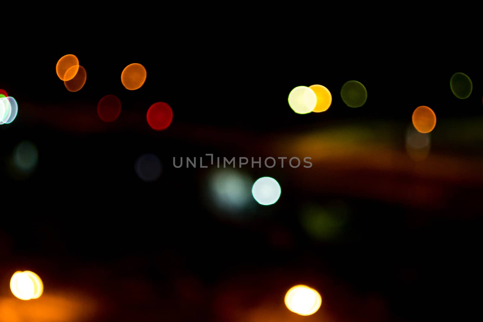 yellow lights on a black background abstraction night city