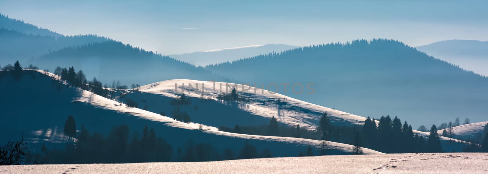gorgeous winter panorama of rolling hills by Pellinni