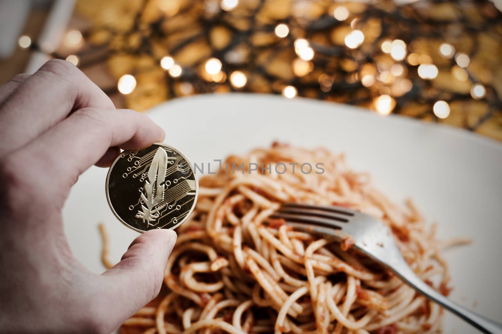 Digital currency physical gold feather coin. Italian pasta food concept.