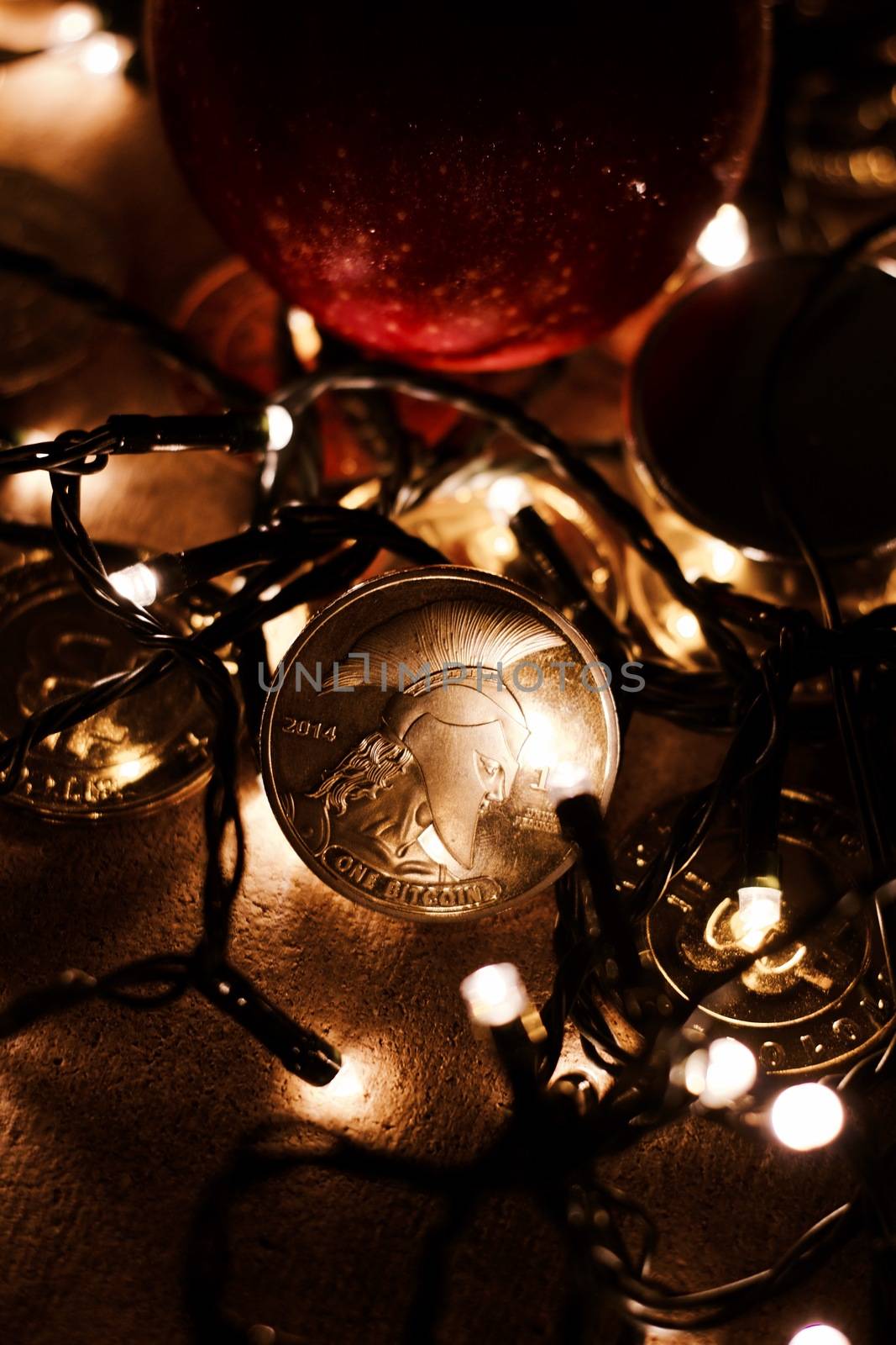 Digital currency physical metal bitcoin coin. Christmas cryptocurrency concept.