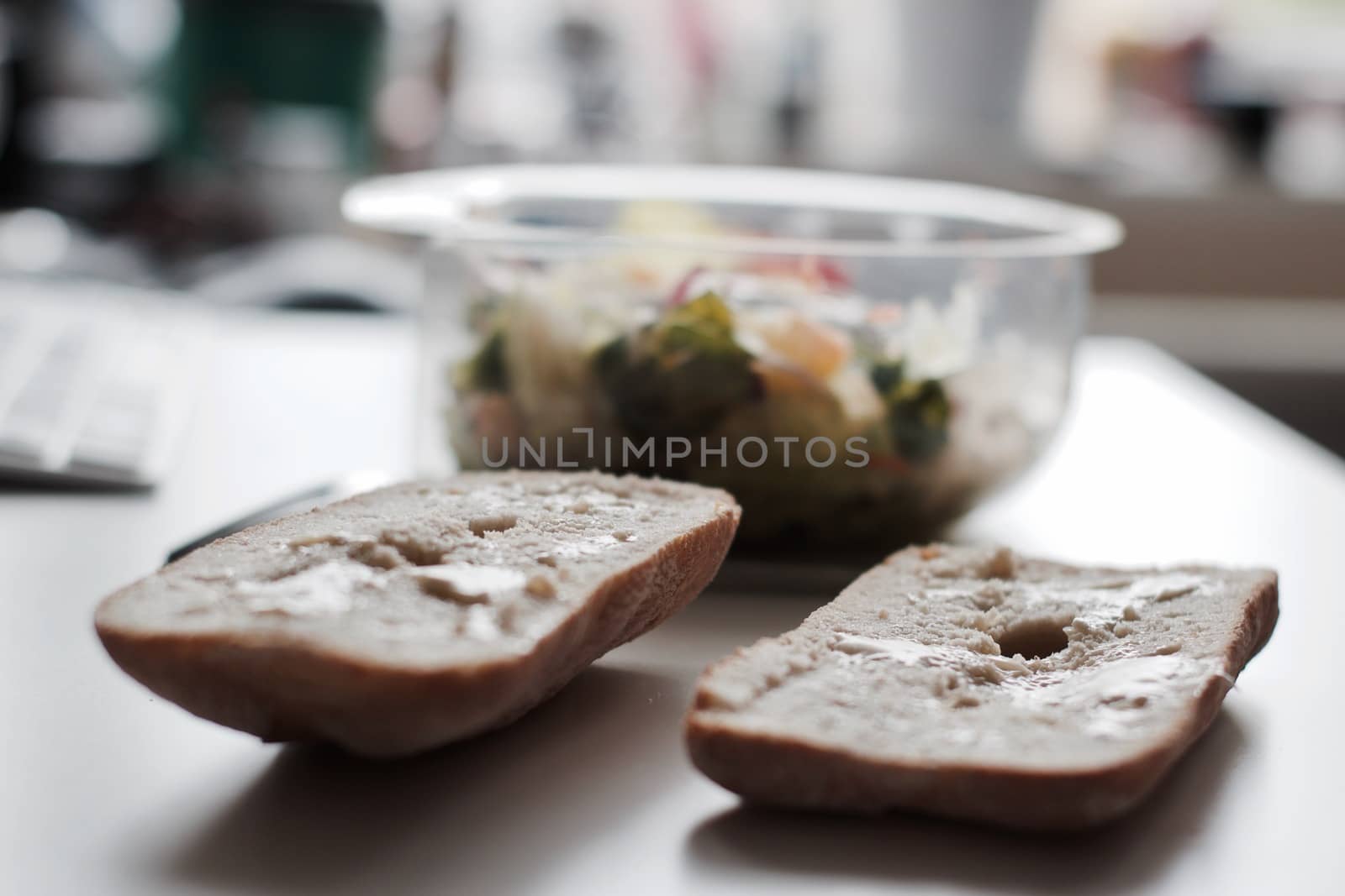 Eat near computer keyboard. Delicious fresh salad with mayo.