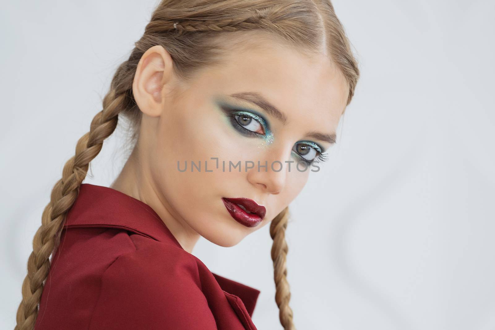 Fashion makeup. Woman with colorful makeup and body art by 3KStudio