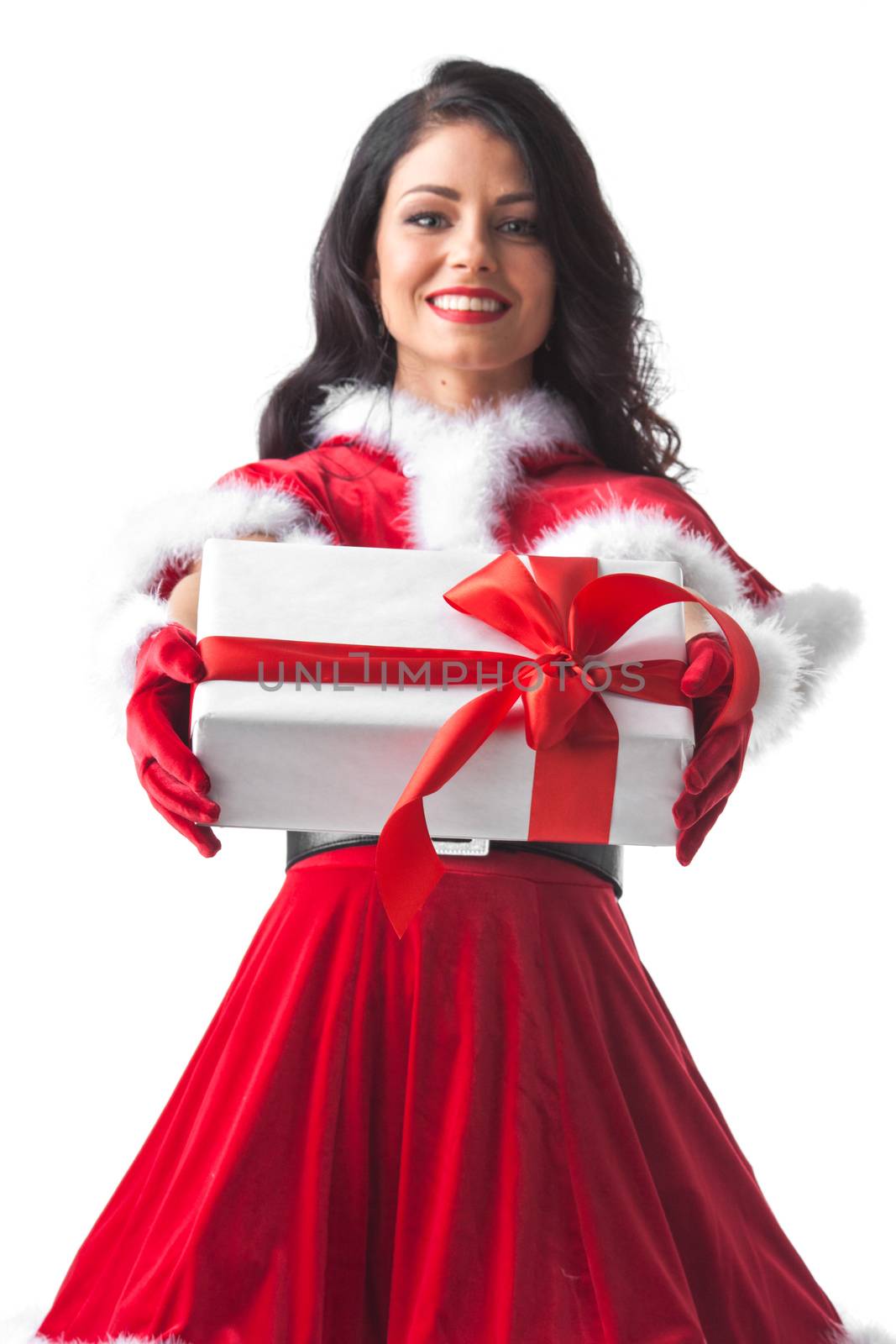 Beautiful woman in Santa Claus style dress with gift box