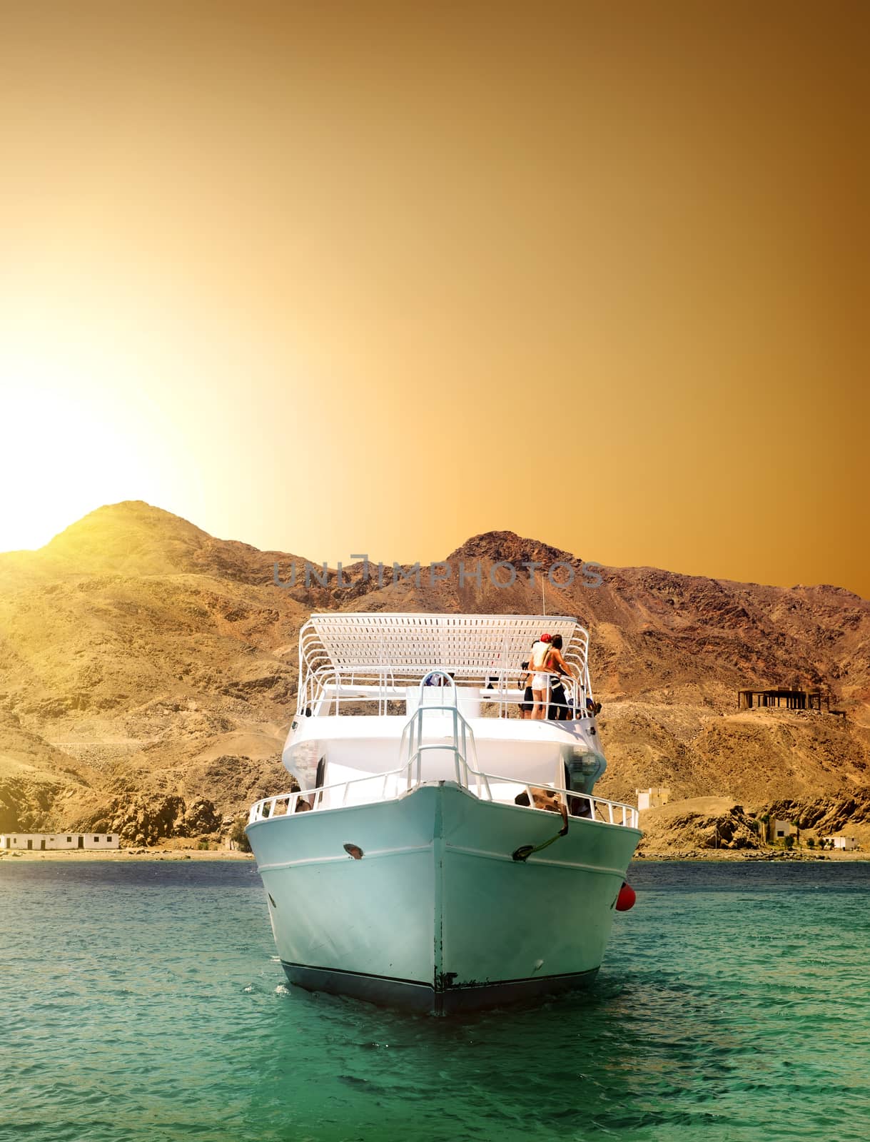 Beautiful yacht in the sea near mountain