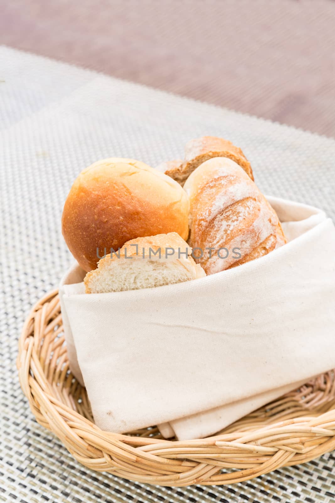 Fresh bread in the basket. Food background.