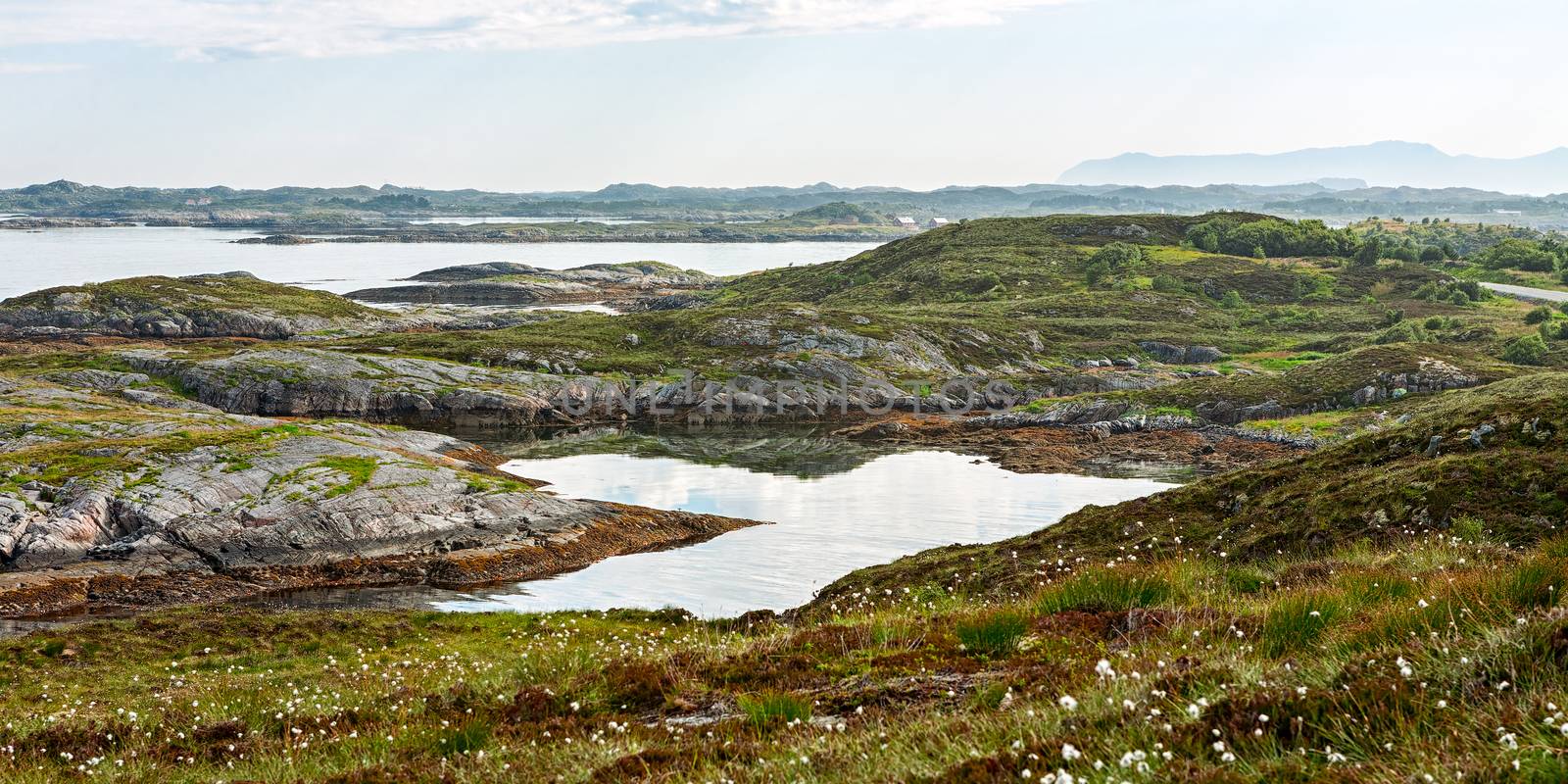 Panorama of the mountain and ocean from the Atlantic road in Hulvagen, Norway