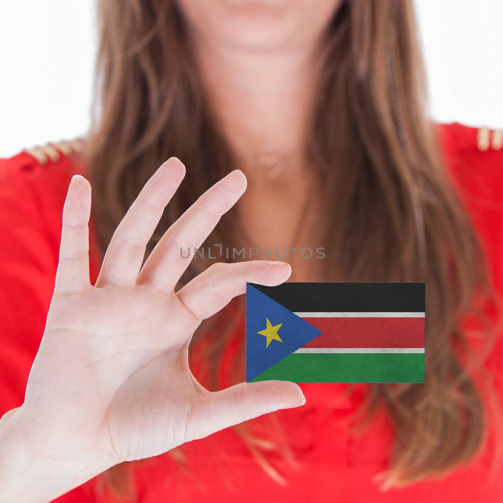 Woman showing a business card - South Sudan by michaklootwijk