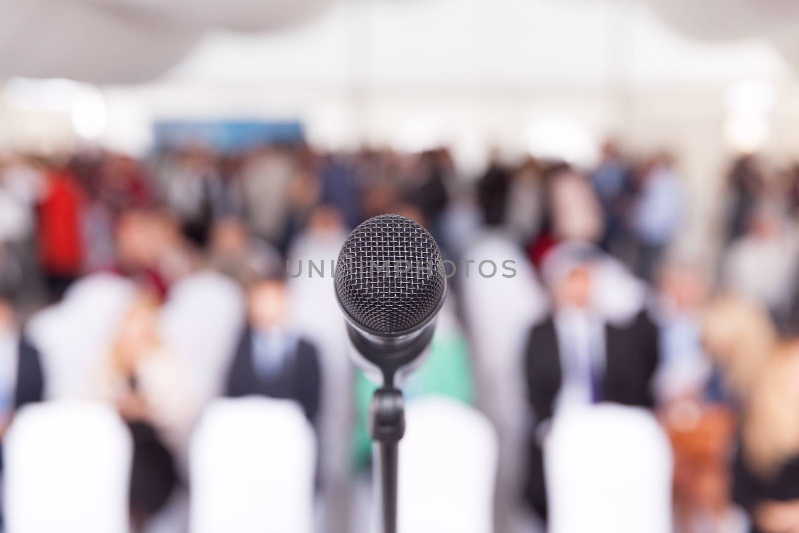 Business conference. Microphone. Corporate presentation. by wellphoto