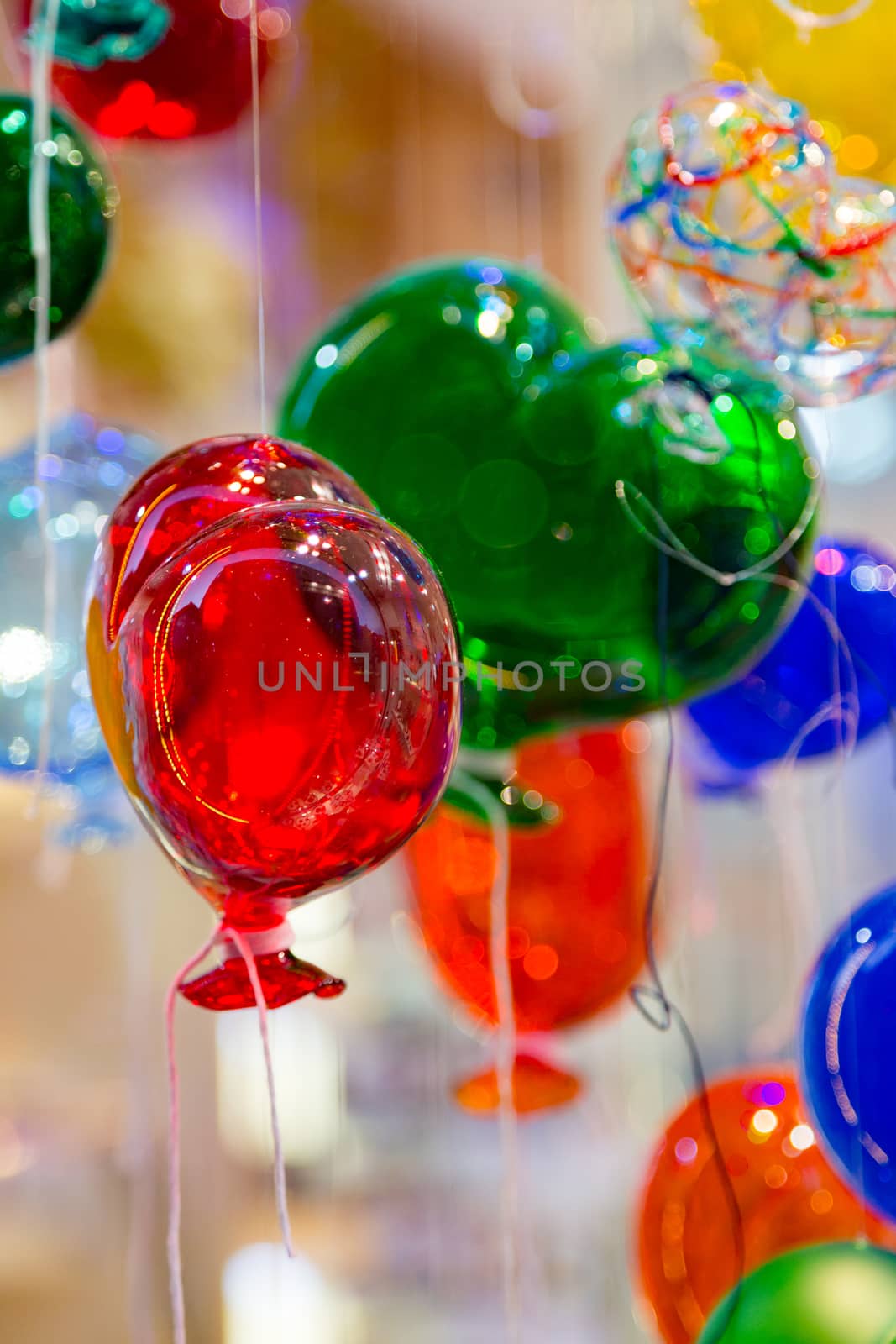 Balloons of Murano glass. Balloons made of Murano glass in the form of hearts. Colorful balloons made of Venetian Murano Glass.