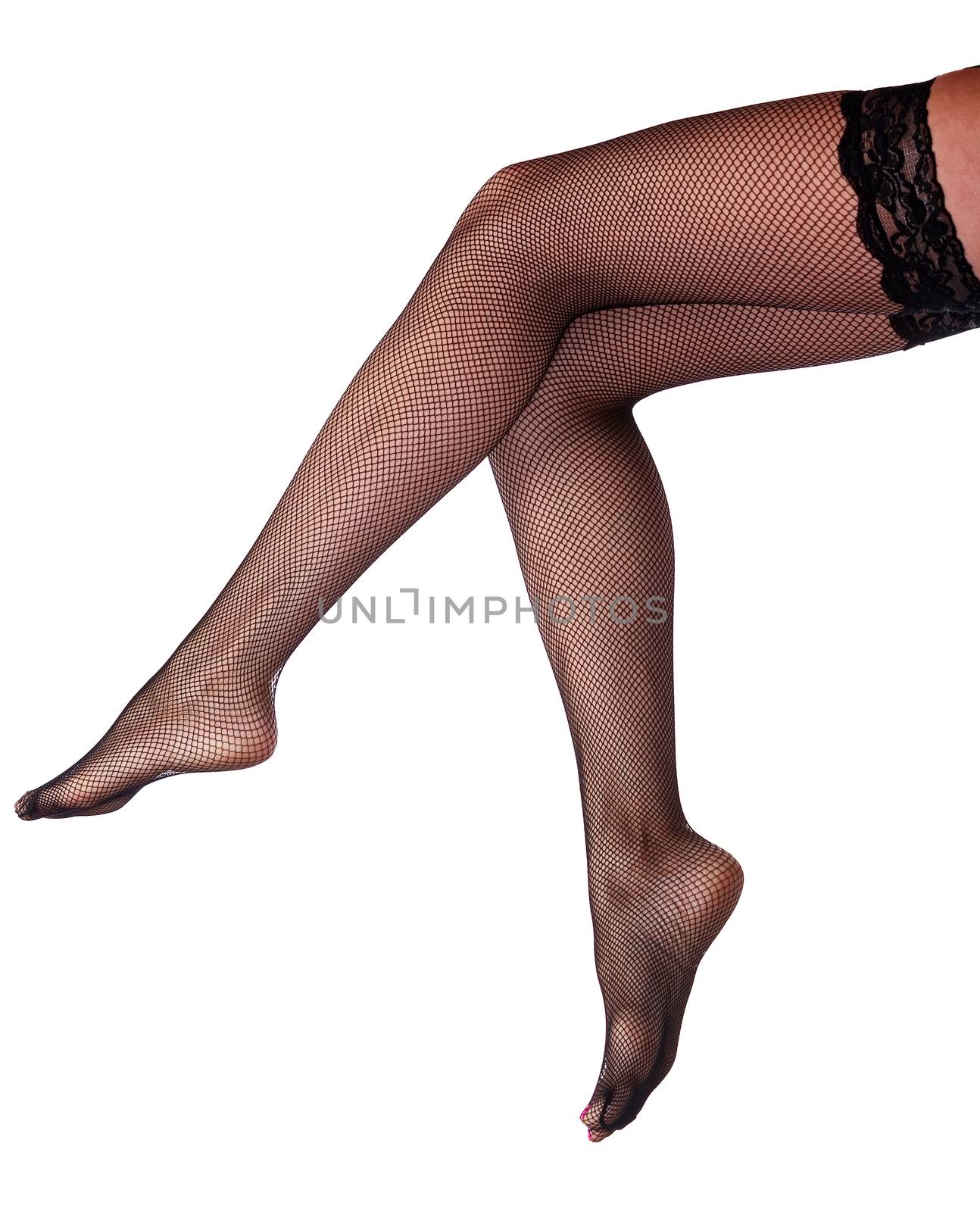 Beautiful long woman's legs in black net pantyhose, isolated on white background