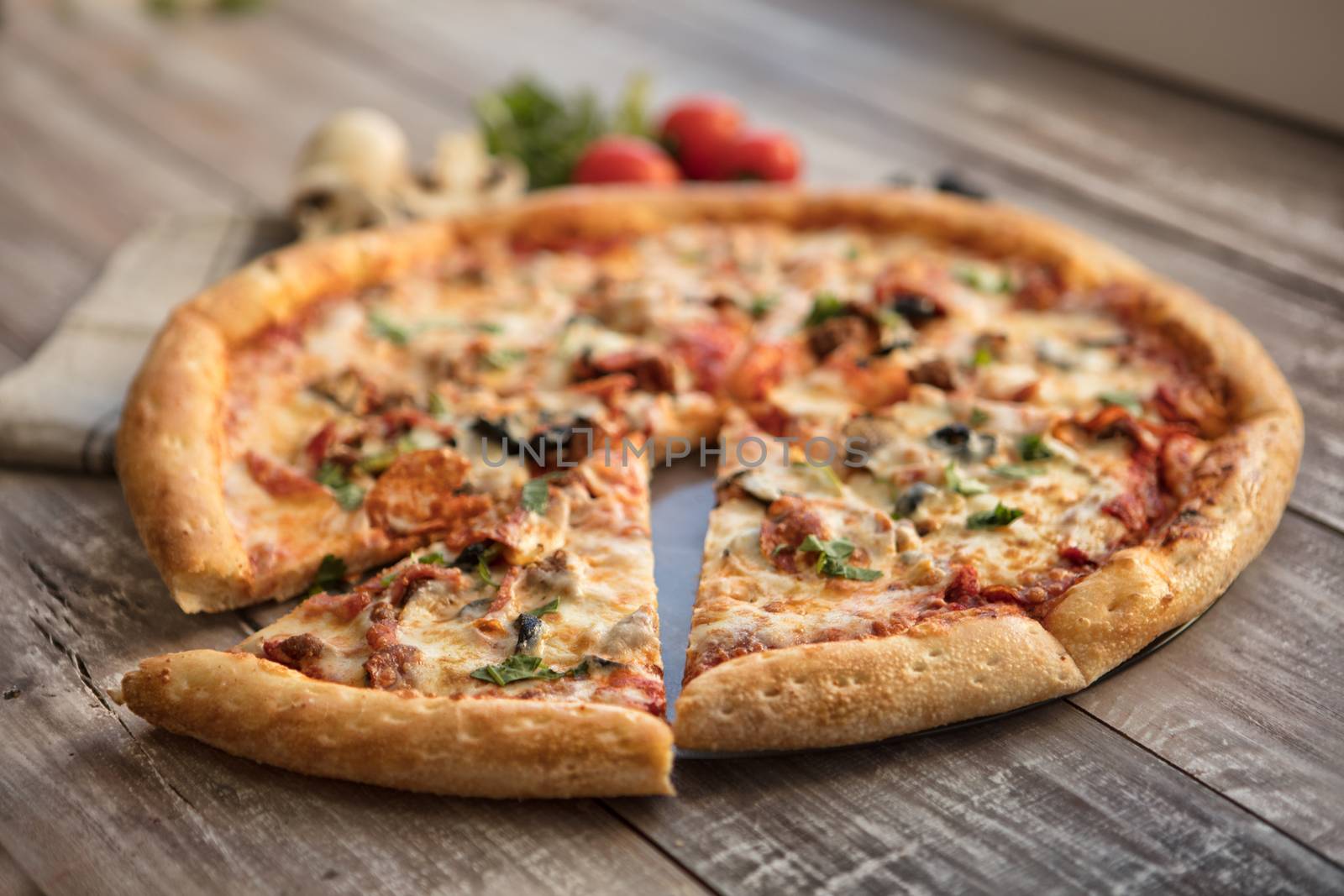 Pizza on an old wooden table