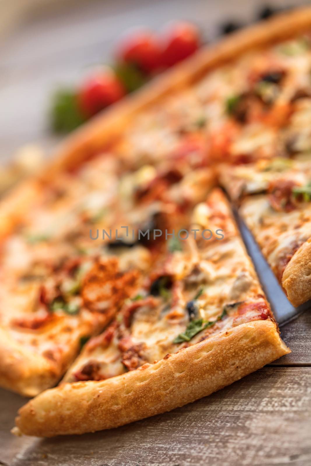 Pizza on an old wooden table