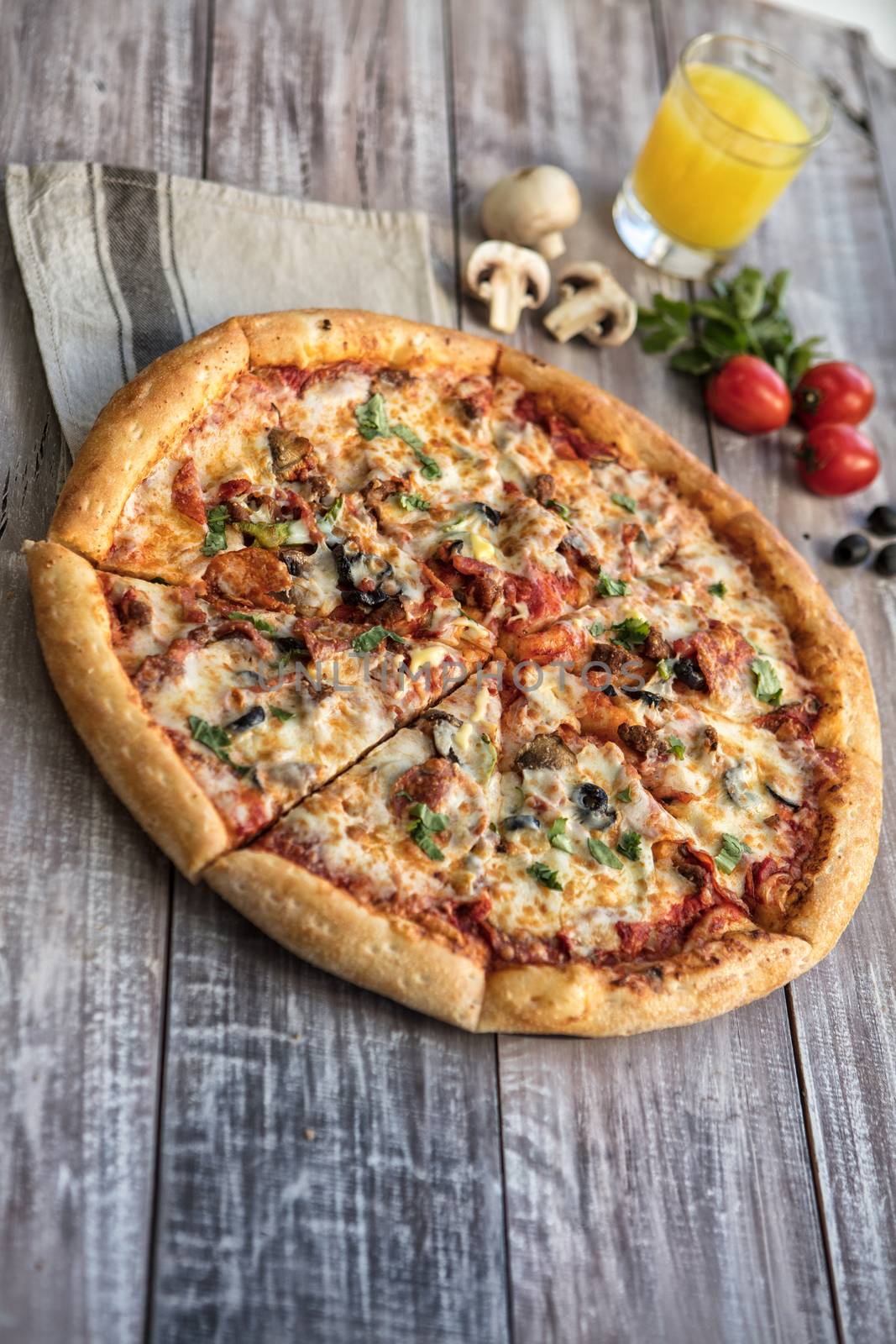 Pizza on an old wooden table