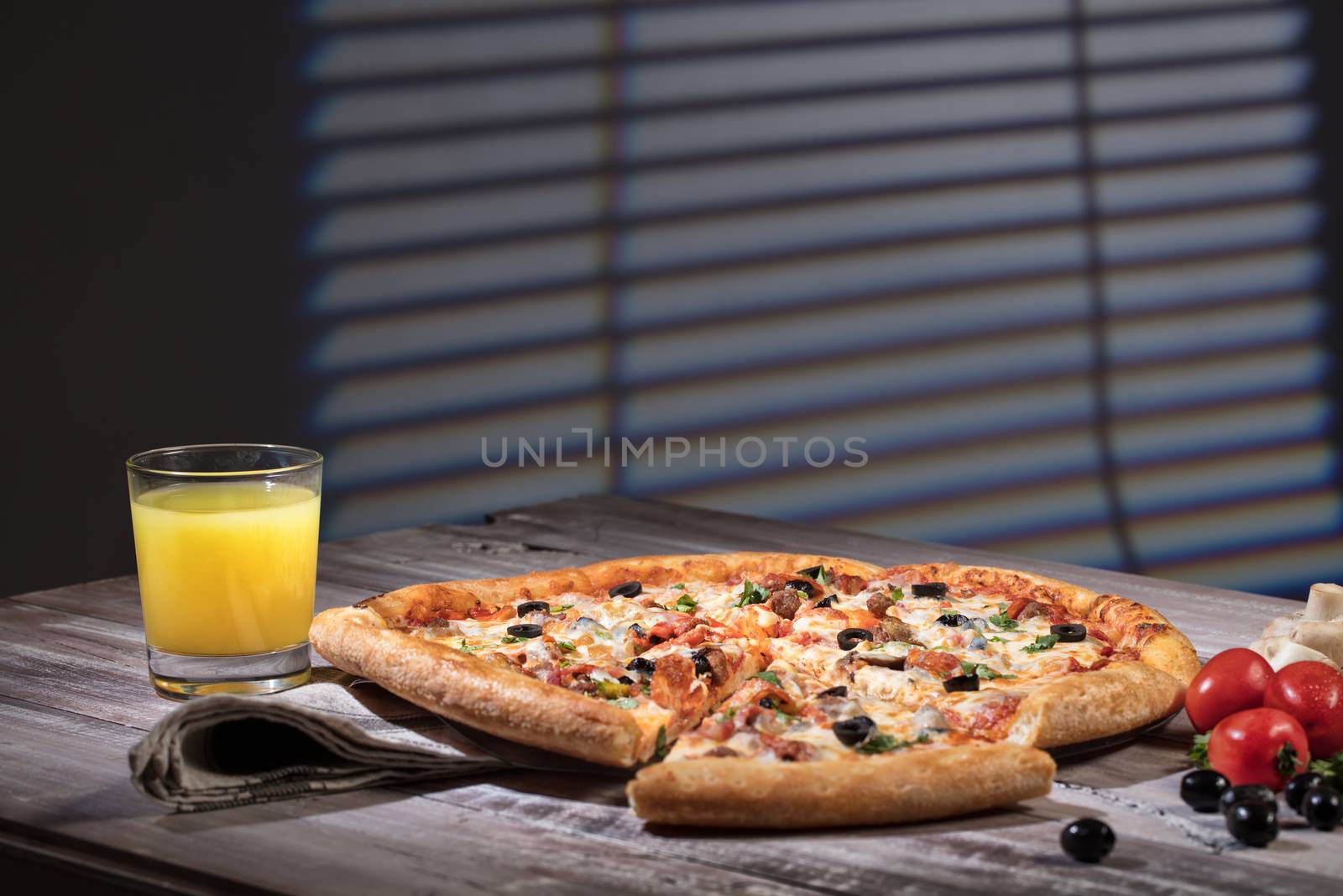 Pizza on an old wooden table