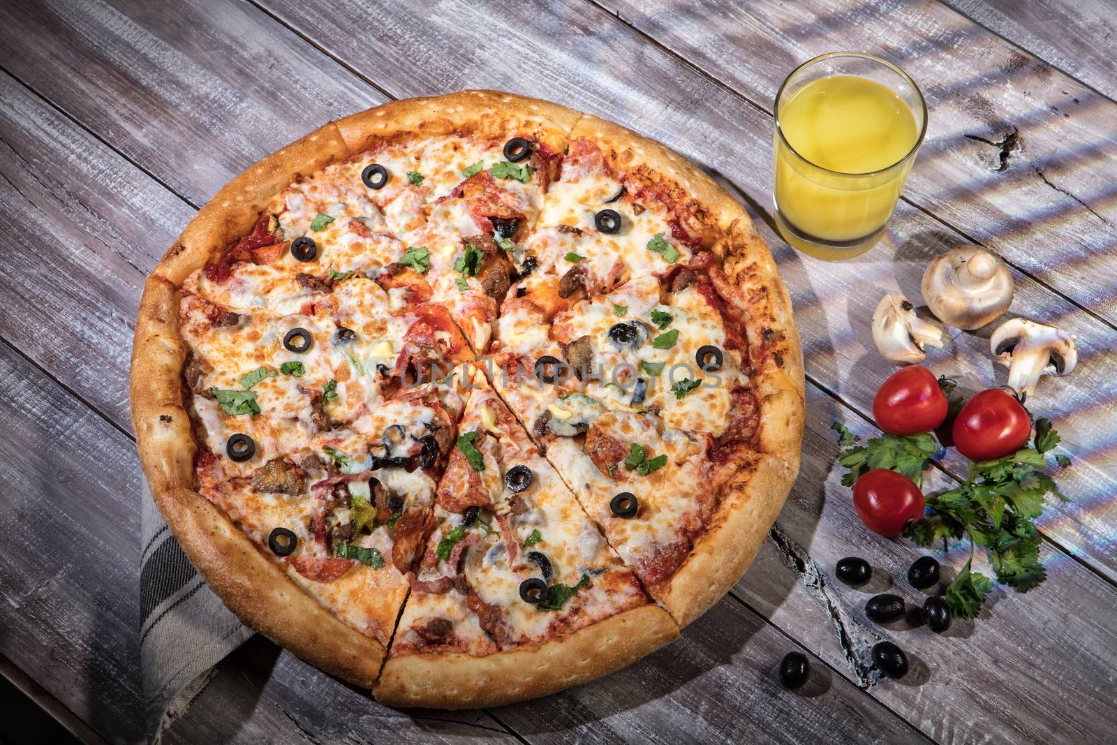 Pizza on an old wooden table