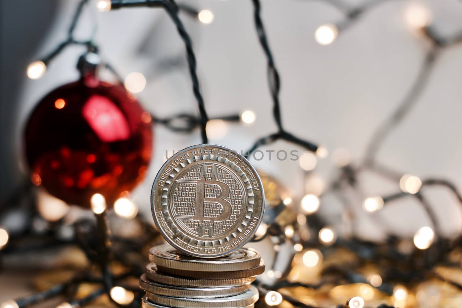 Crypto currency physical metal bitcoin coin. Digital currency christmas concept.