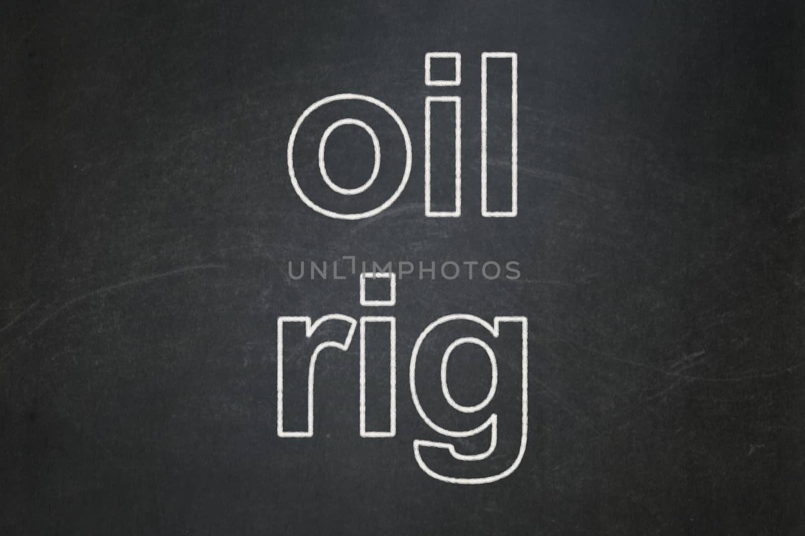 Manufacuring concept: text Oil Rig on Black chalkboard background