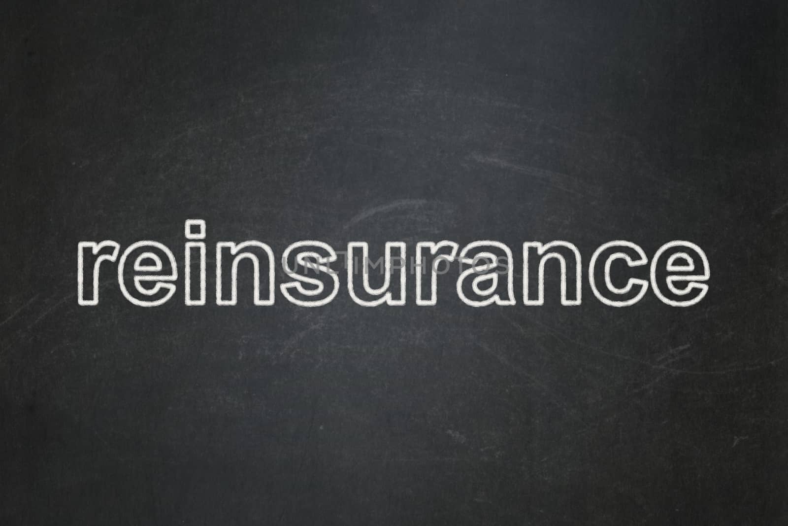 Insurance concept: Reinsurance on chalkboard background by maxkabakov