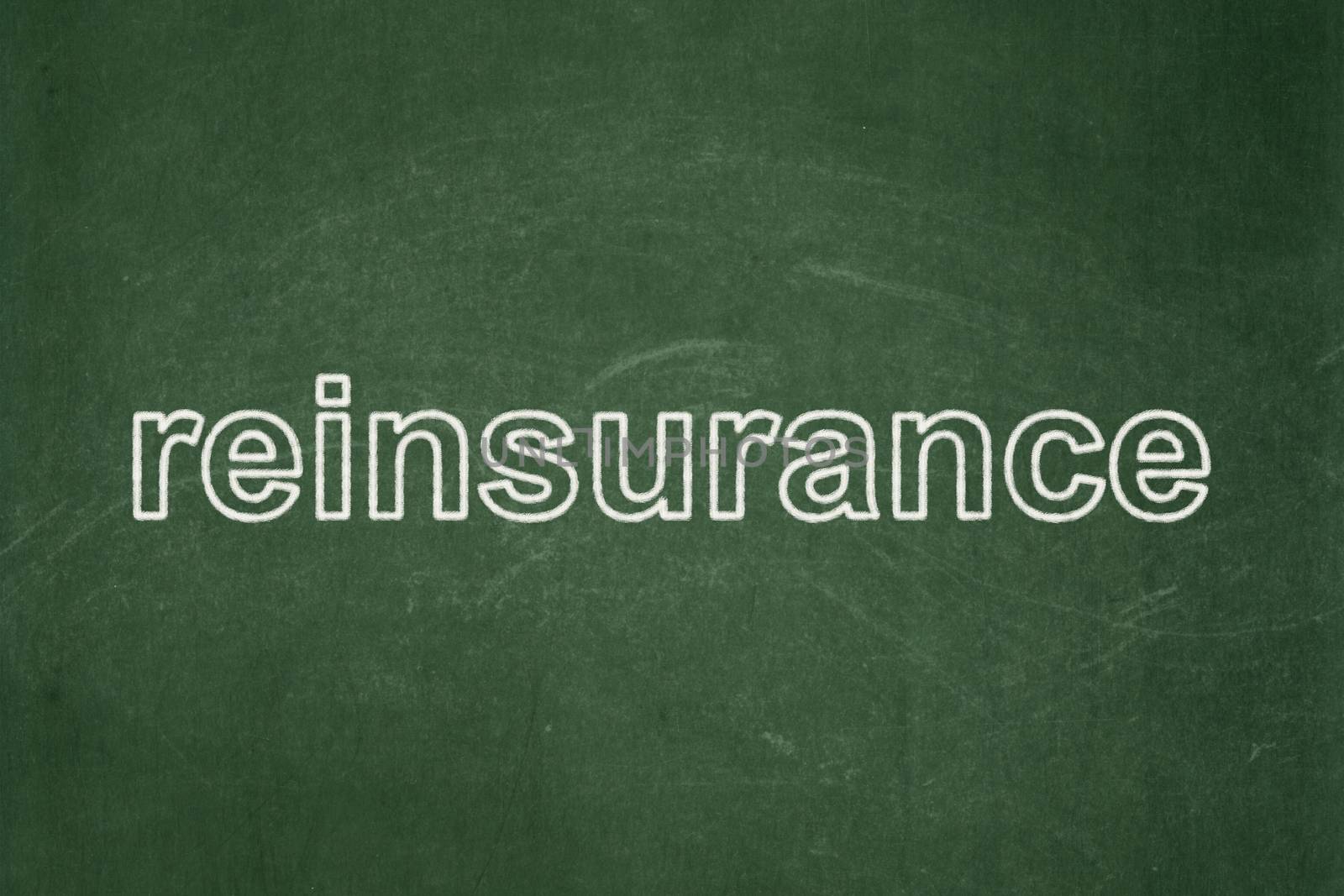 Insurance concept: text Reinsurance on Green chalkboard background