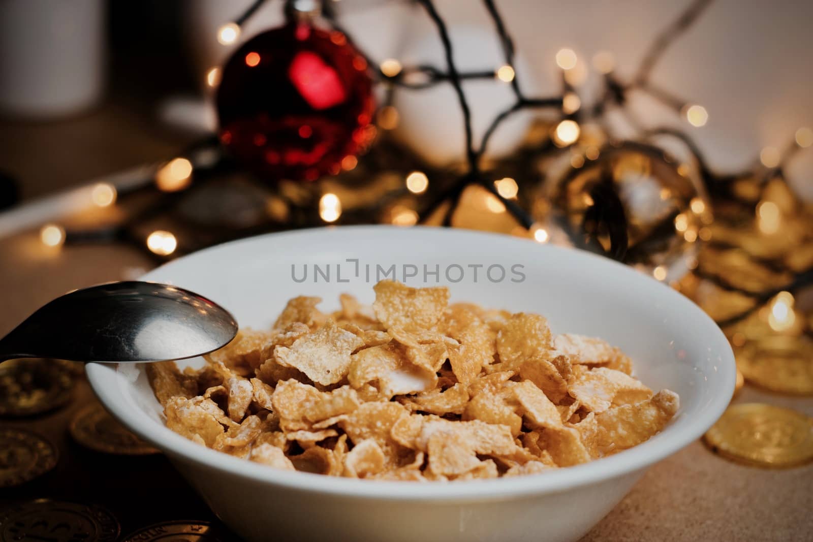 Delicious and fresh corn flakes in white bowl. Christmas food concept.