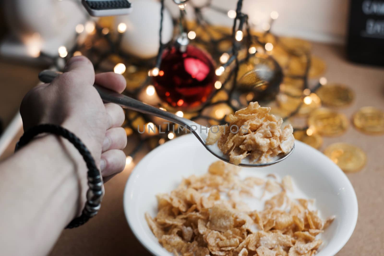 Delicious and fresh corn flakes in white bowl. Christmas food concept.