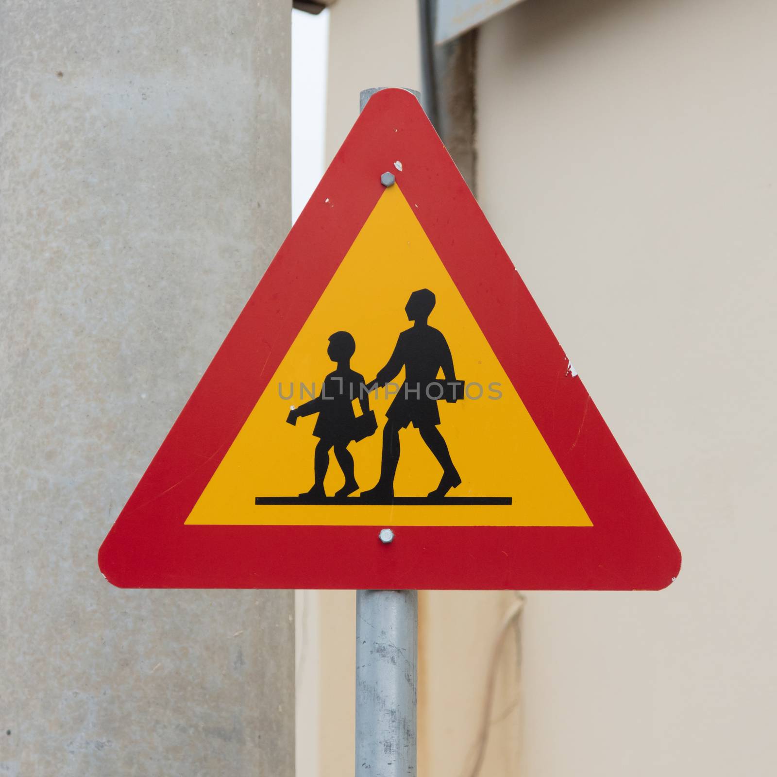 Warning sign of children crossing street from school by michaklootwijk