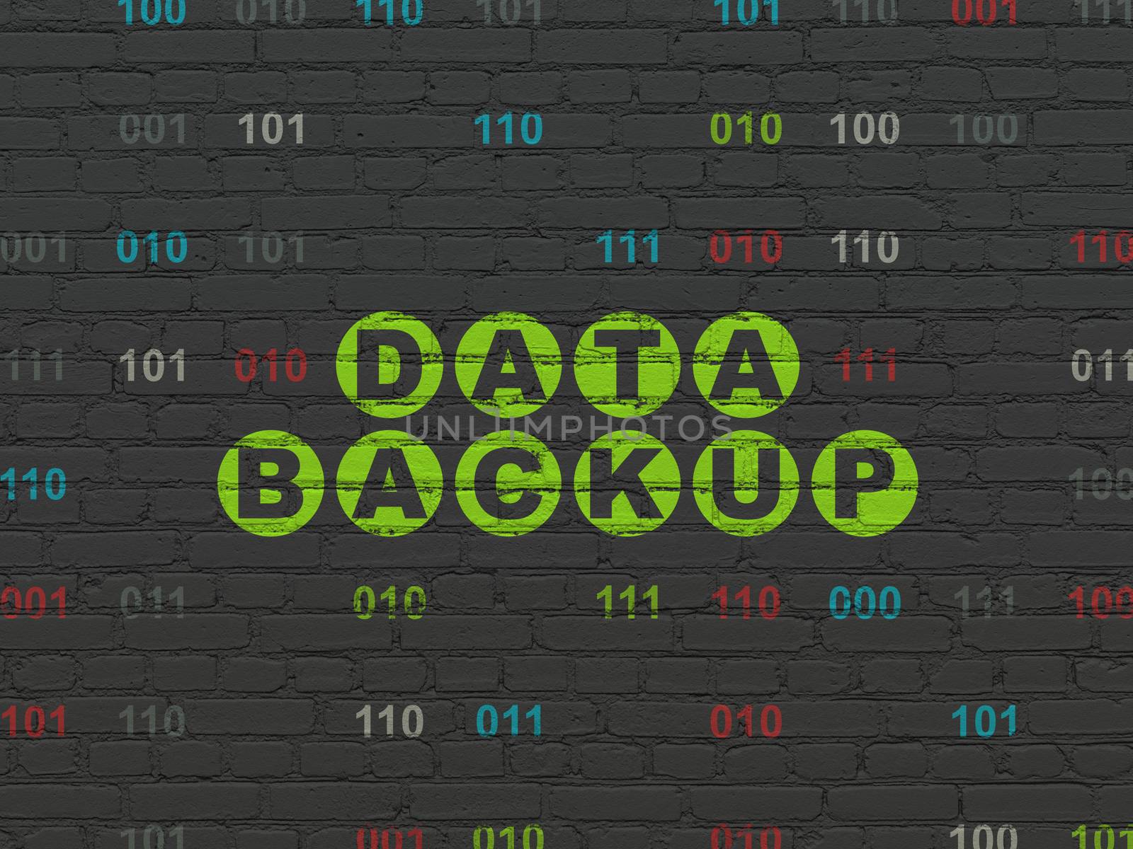 Data concept: Painted green text Data Backup on Black Brick wall background with Binary Code