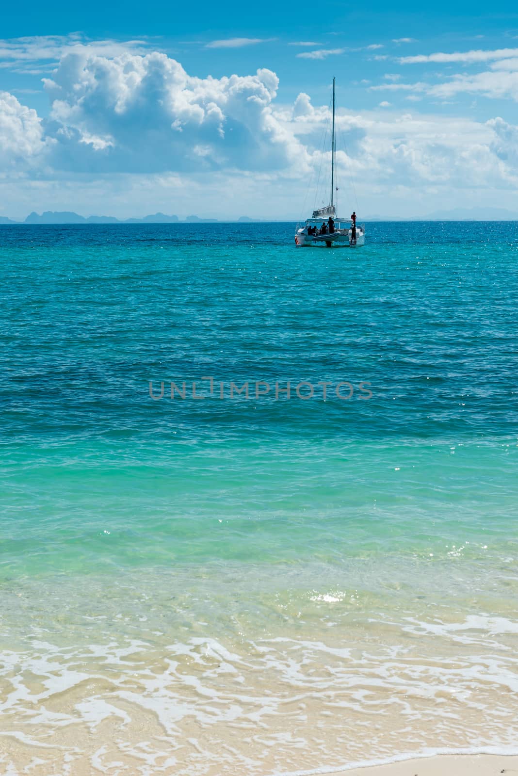 a sunny day in Thailand, a catamaran in the Andaman Sea, a beautiful landscape