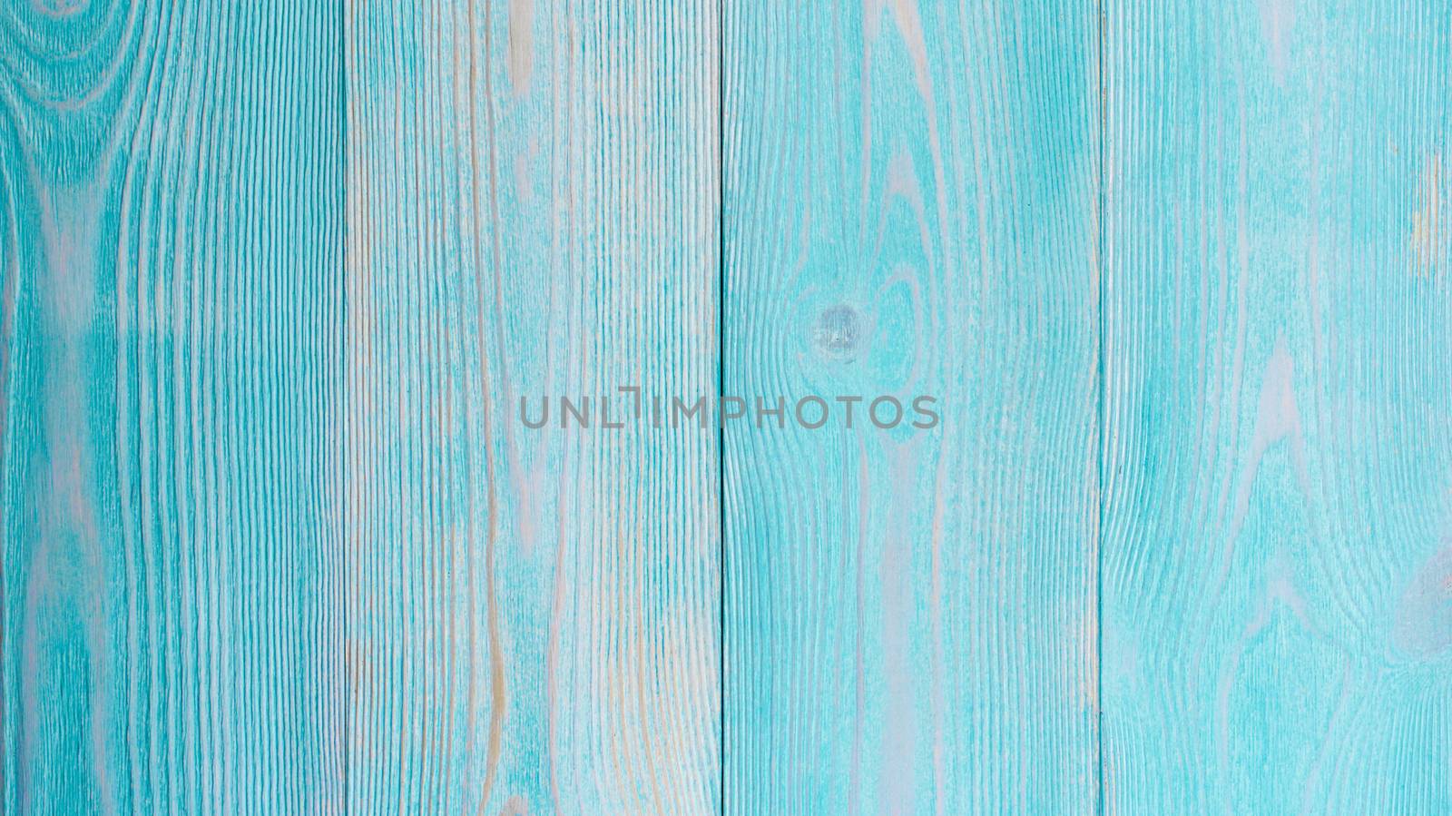 Stain Knot Turquoise and Beige Wooden Background closeup
