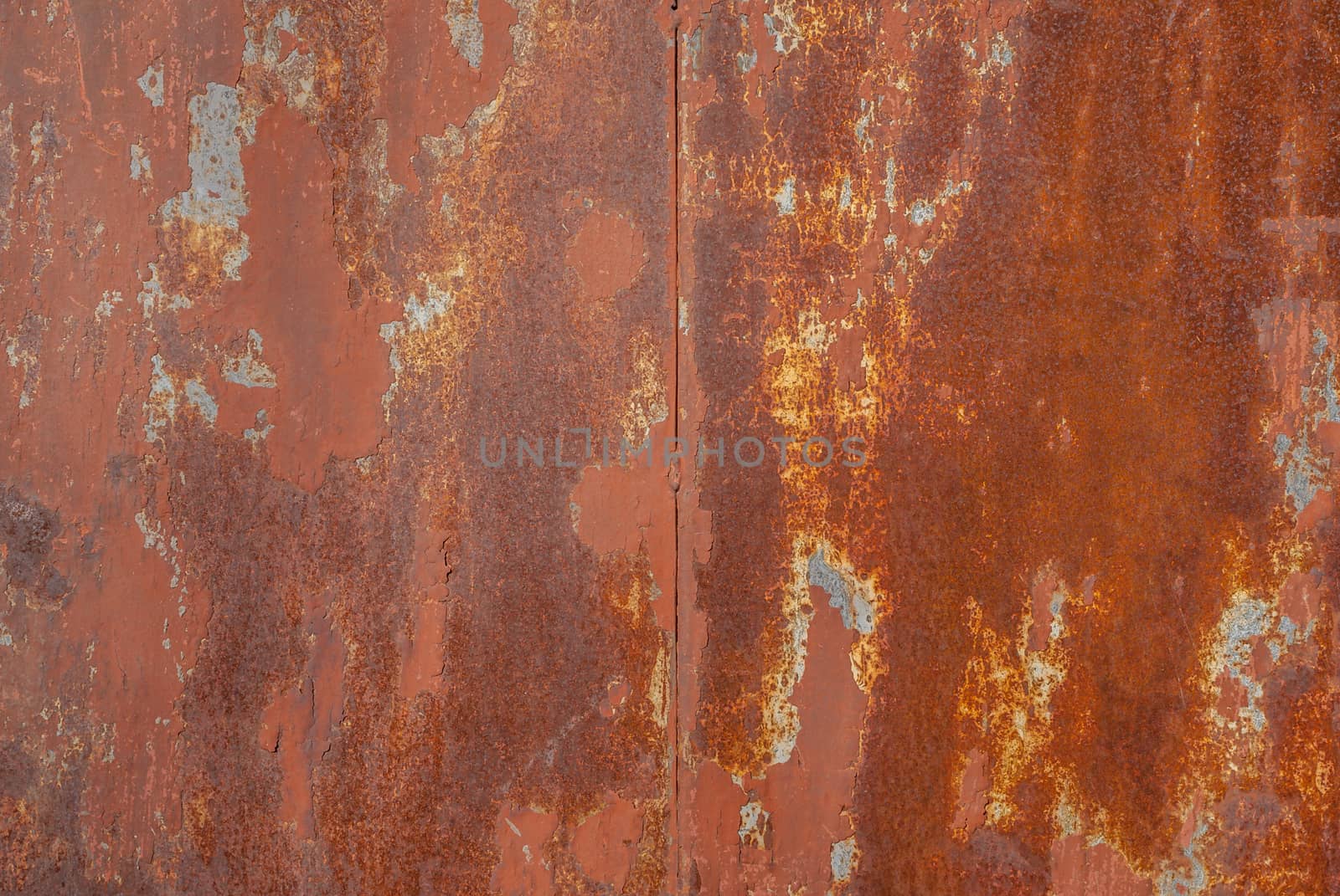 surface of rusty iron with remnants of old paint, texture background by uvisni