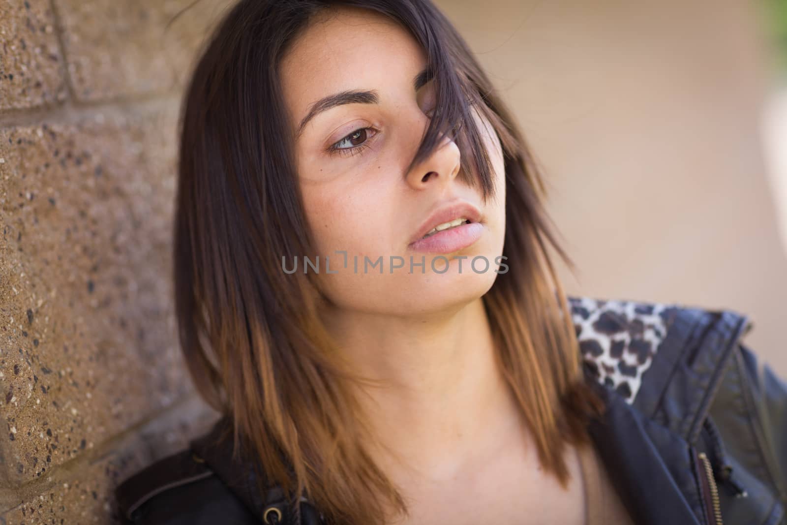 Beautiful Meloncholy Mixed Race Young Woman Portrait Outside.