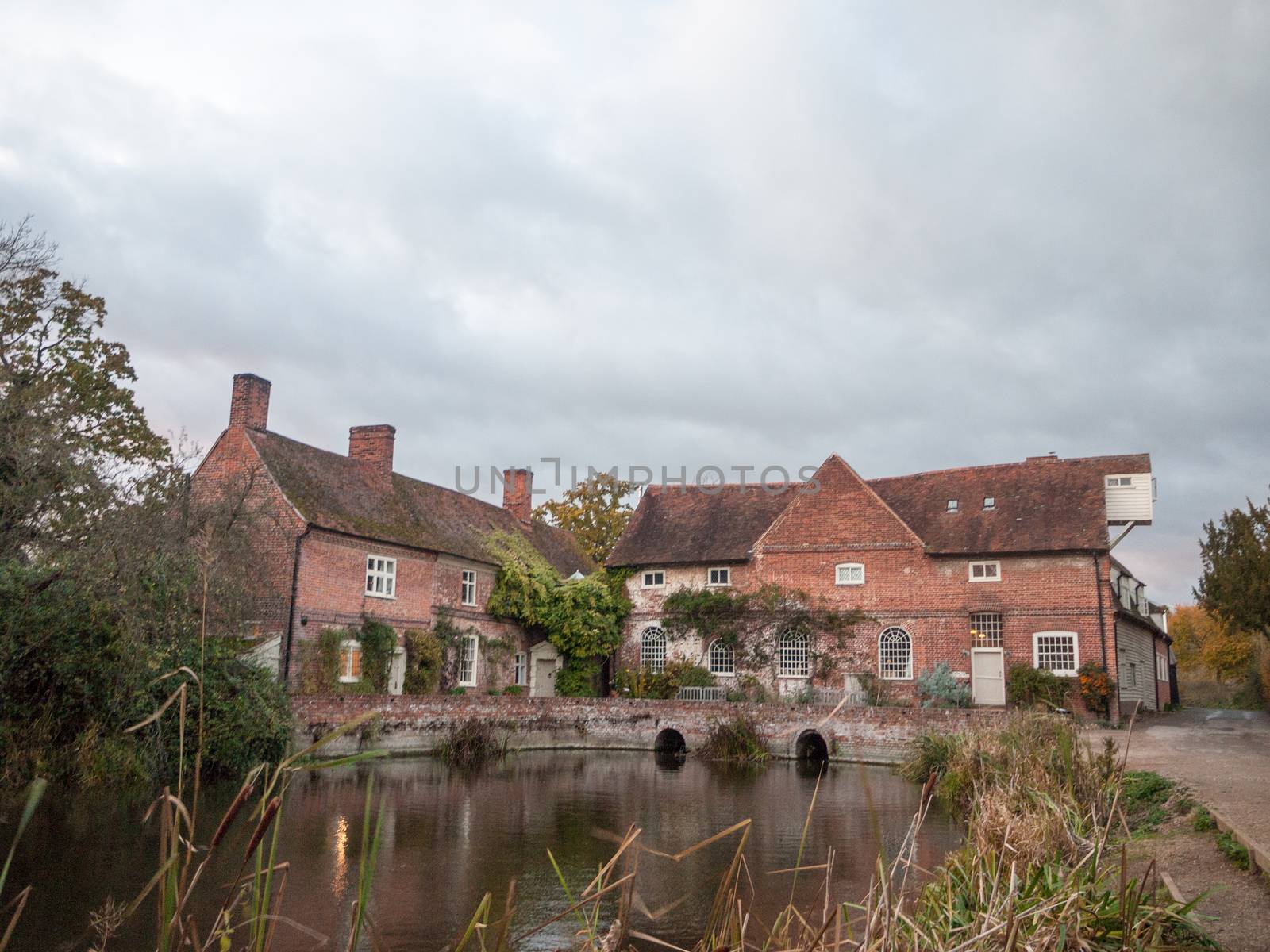 flatford mill building old historical red brick constable country country mill house estate; essex; england; uk