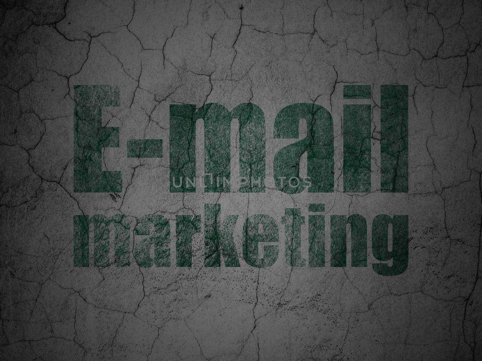 Marketing concept: Green E-mail Marketing on grunge textured concrete wall background