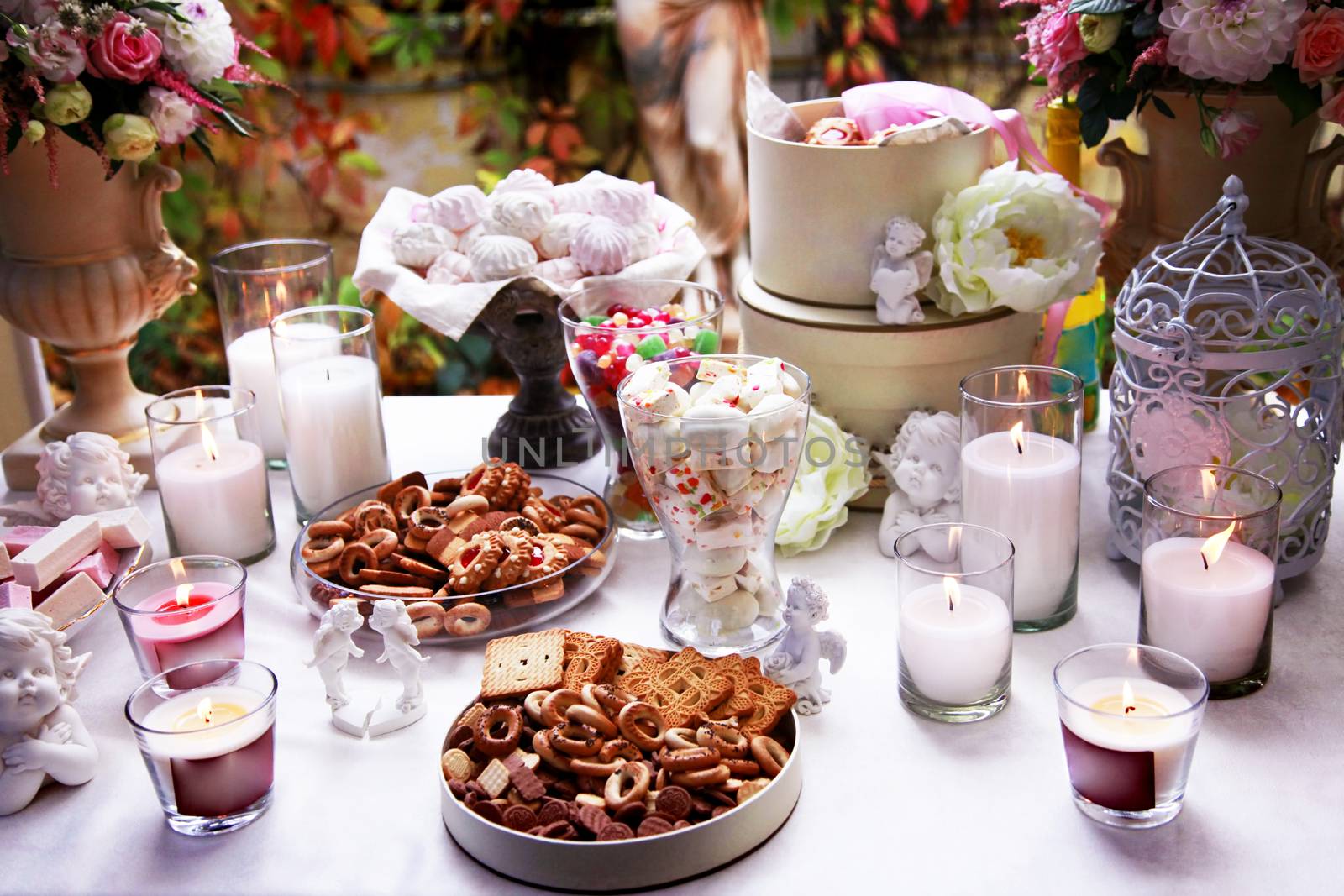 Table with candles beautifully covered for tea