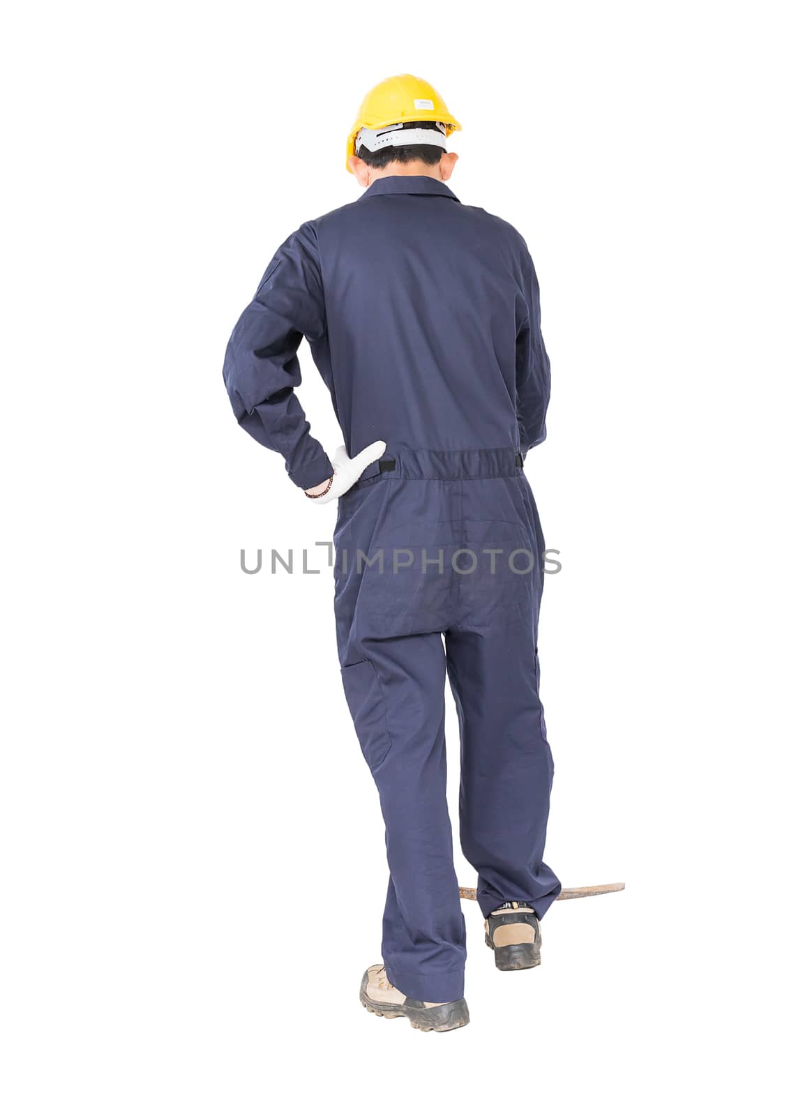 Young man in uniform hold old pick mattock that is a mining device, Cut out isolated on white background