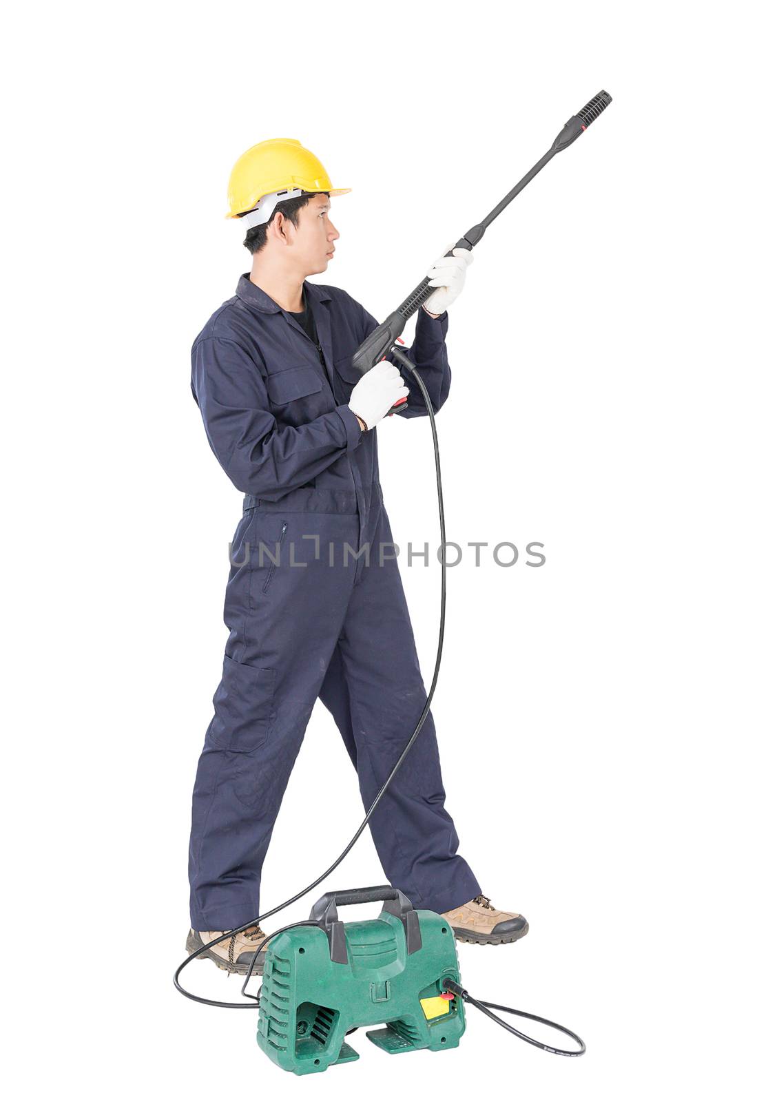 Young man in uniform stand and holding high pressure water gun portable with hose, Cut out isolated on white background