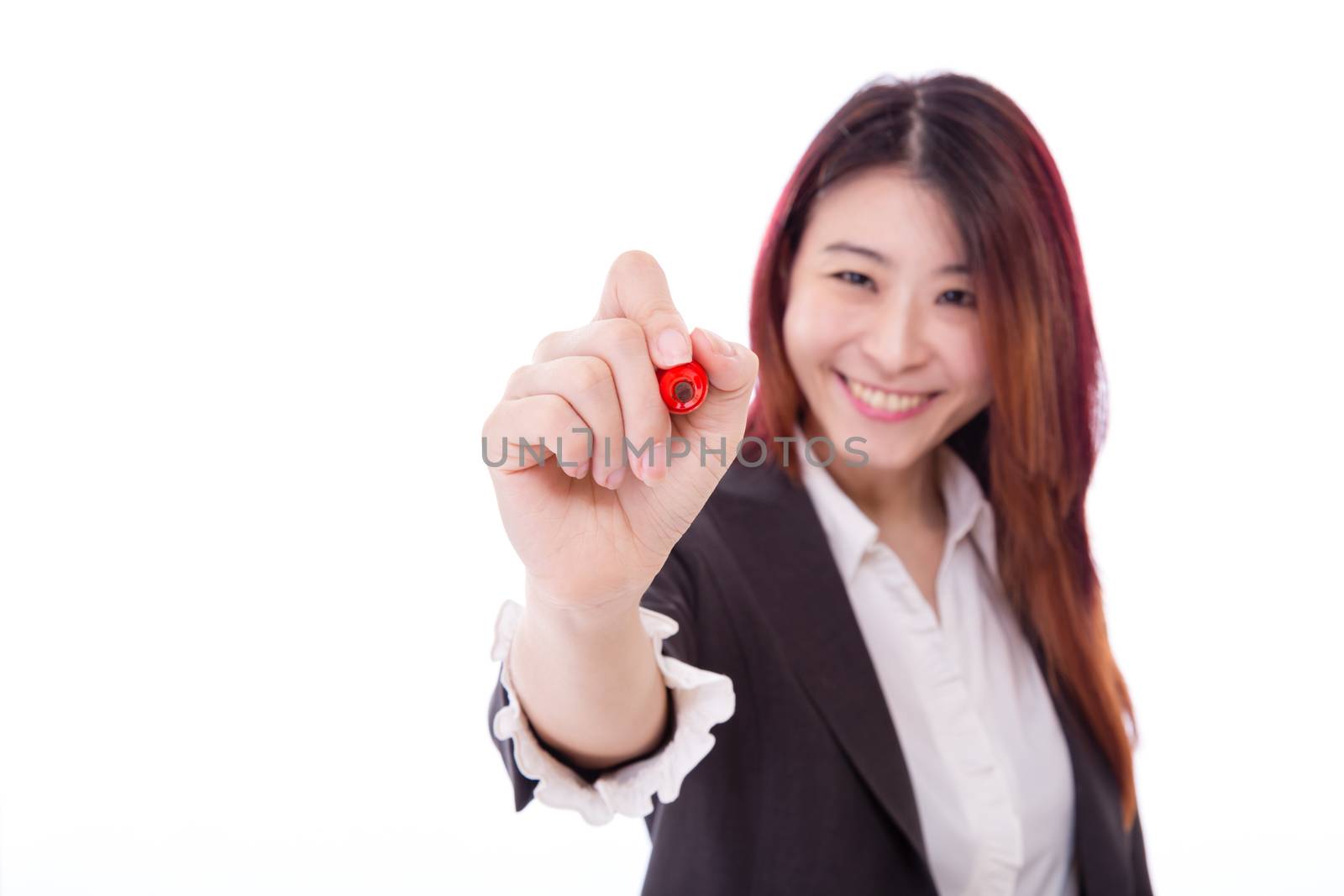 Asian businesswoman writing on virtual screen