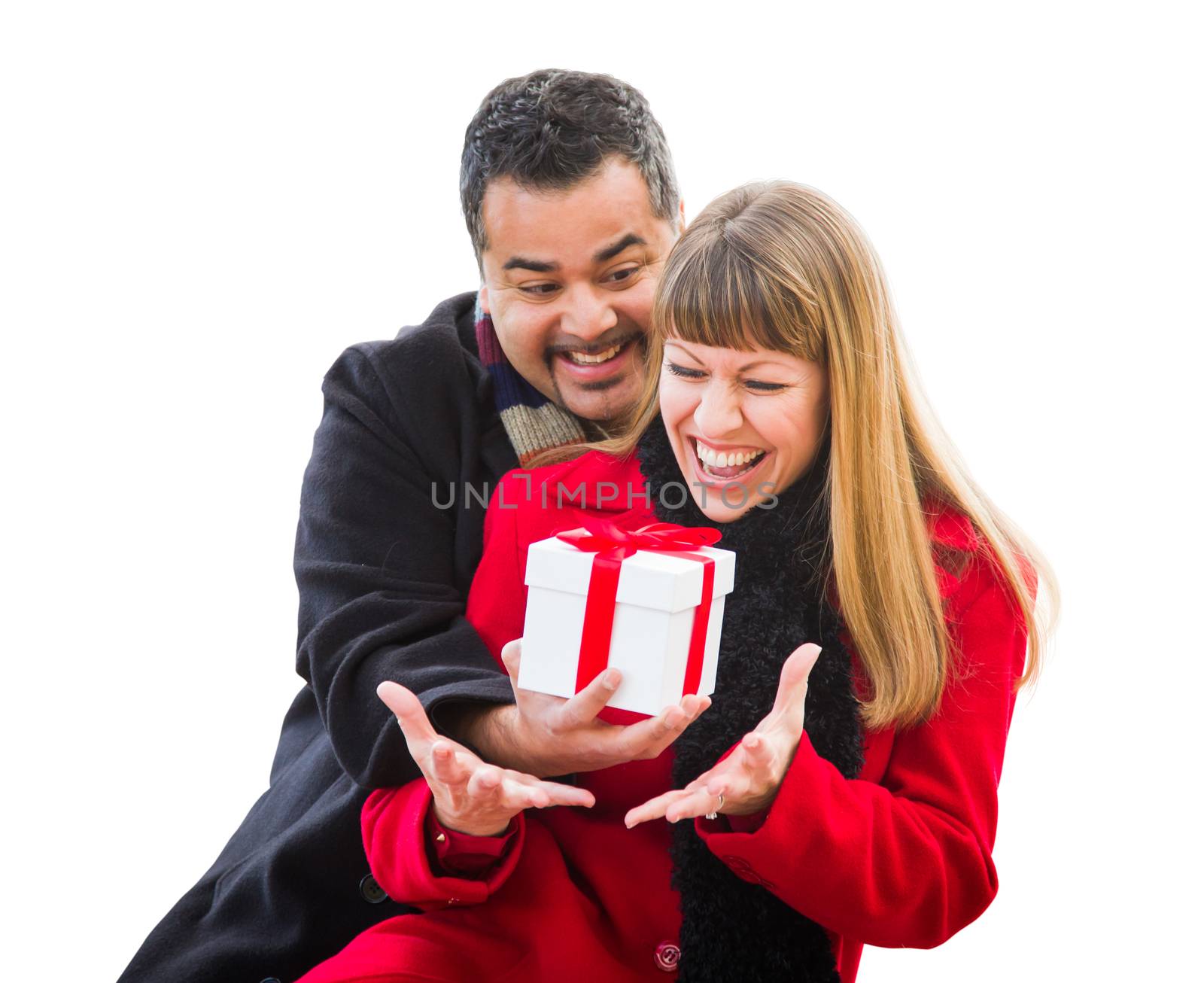 Mixed Race Couple Exchanging Christmas Gift Isolated on White. by Feverpitched