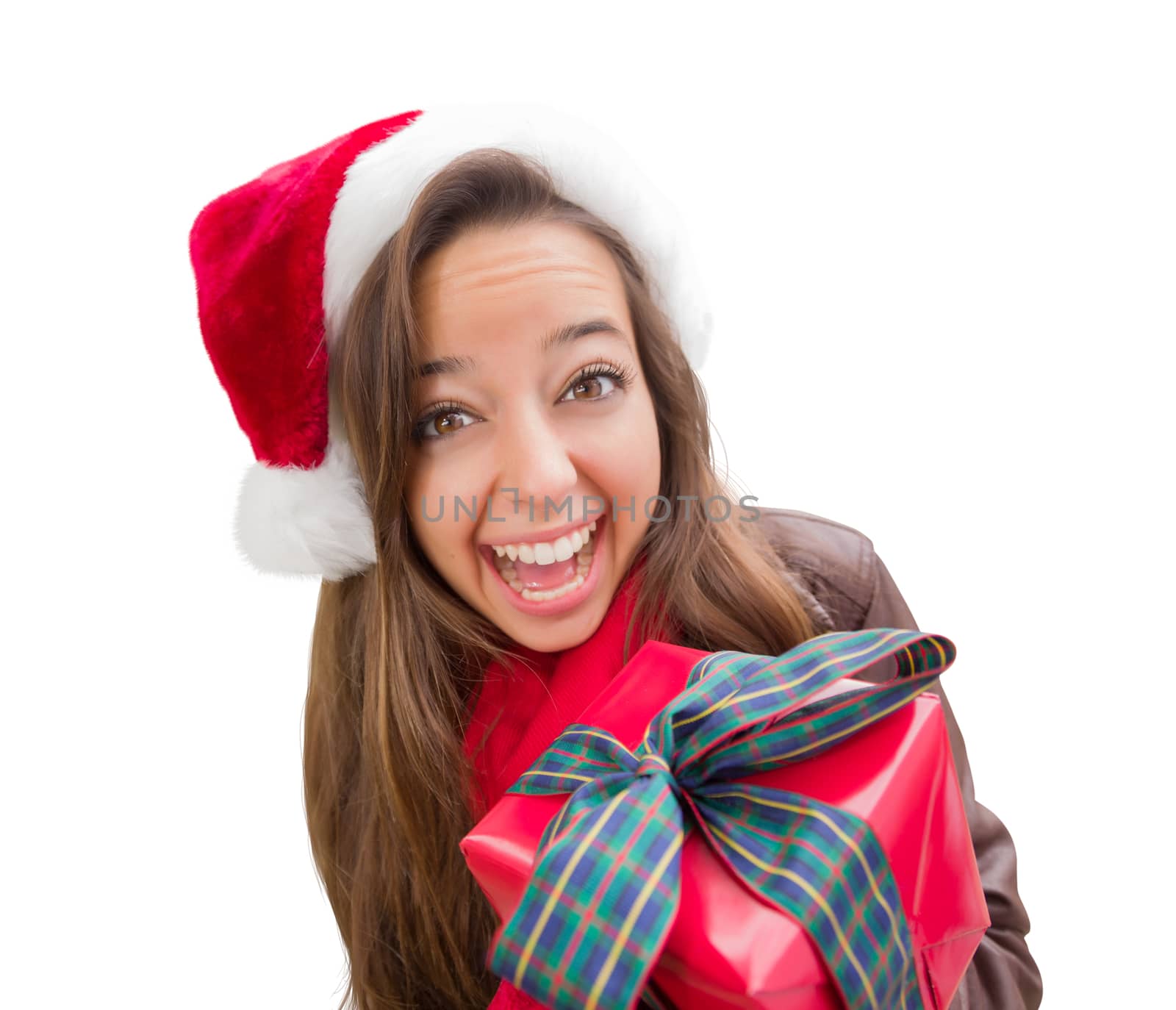 Girl Wearing A Christmas Santa Hat with Bow Wrapped Gift Isolated on White.