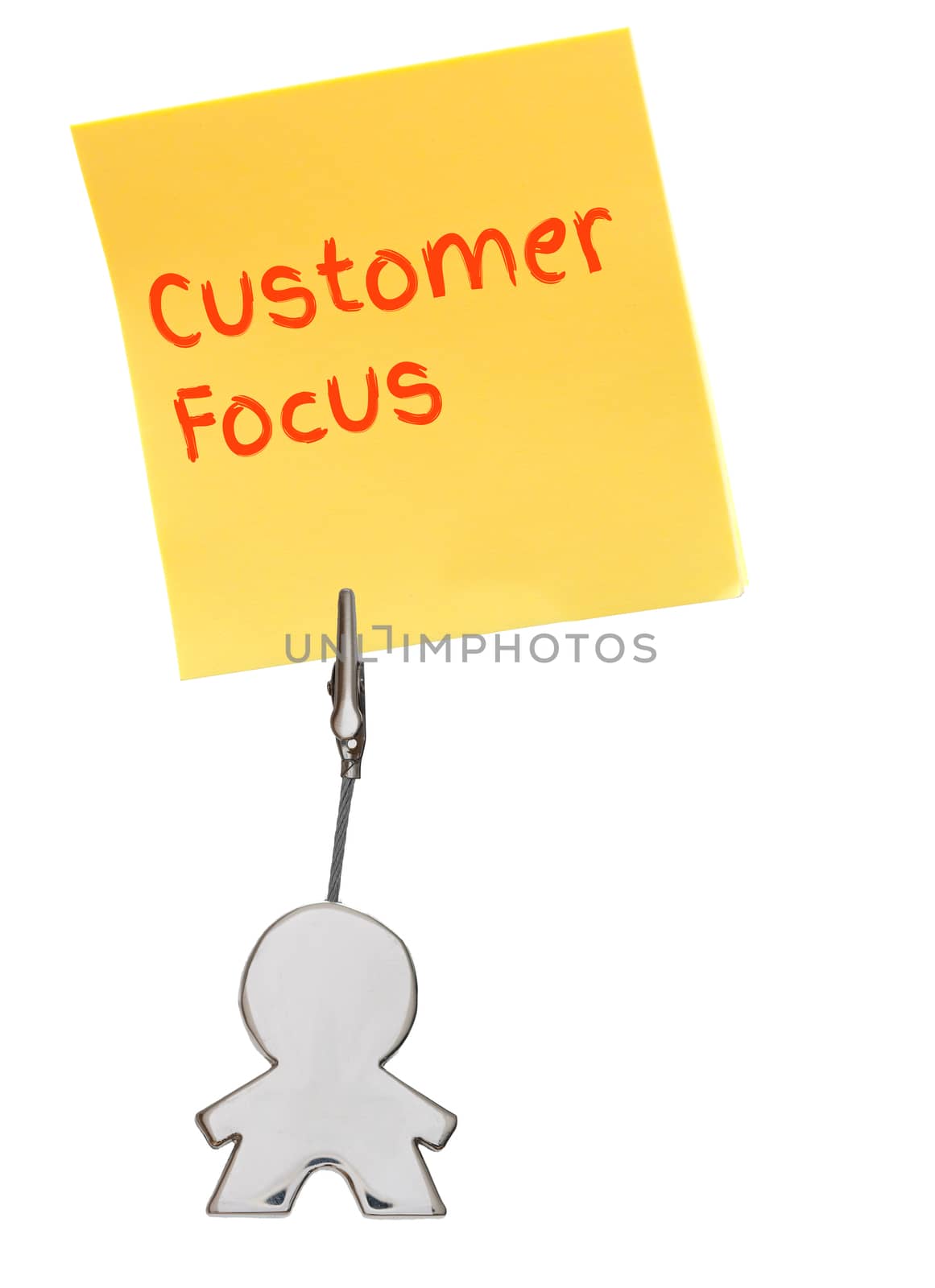 Orange sticker, paper note isolated on white, held by busines card holder figure, business concept, customer focus