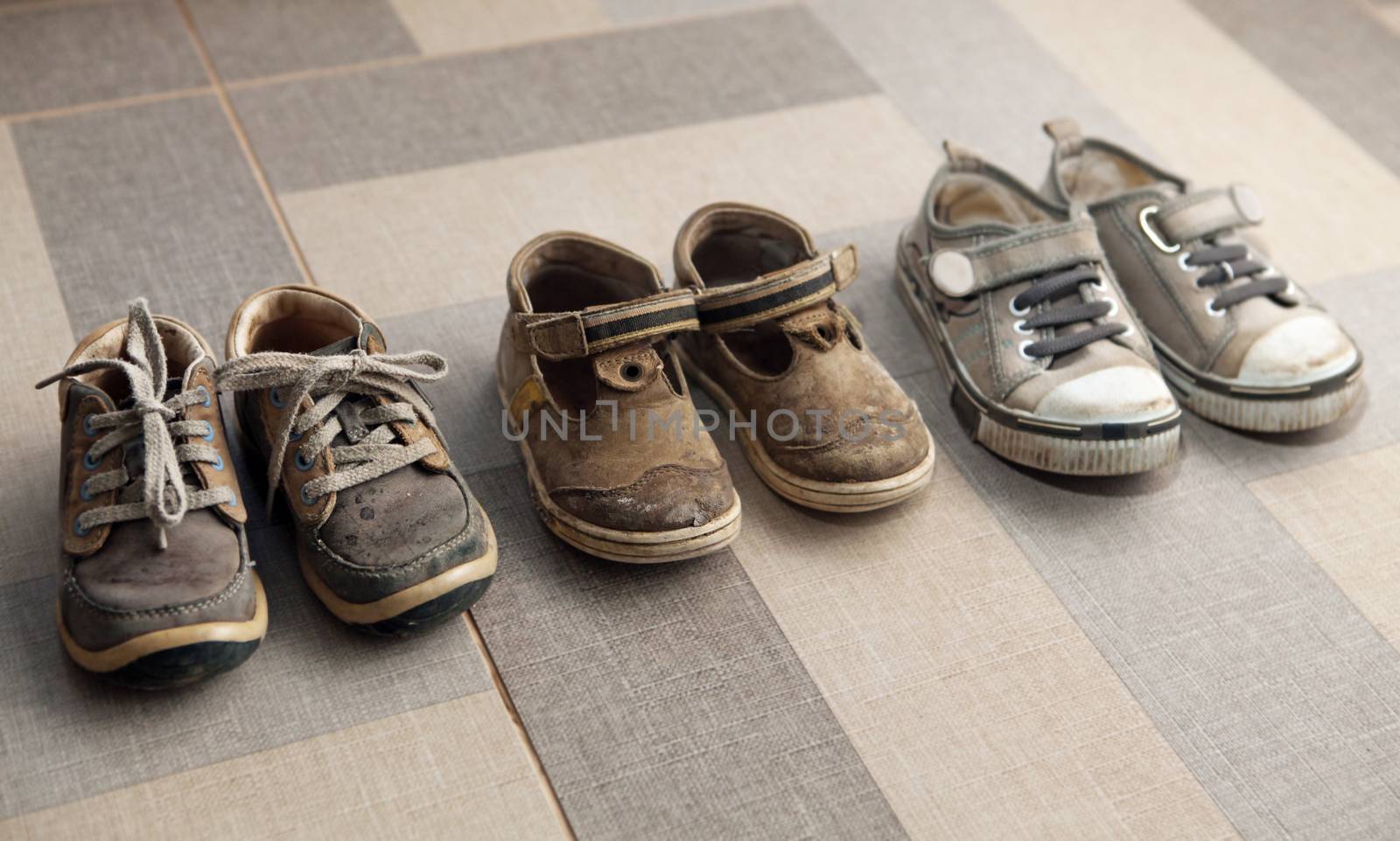 small shoes on floor by ssuaphoto
