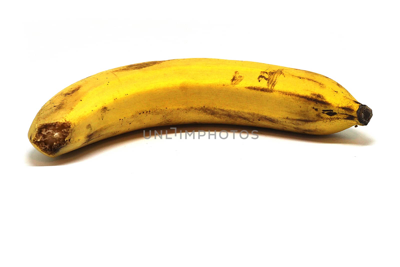 single banana isolated on white background.