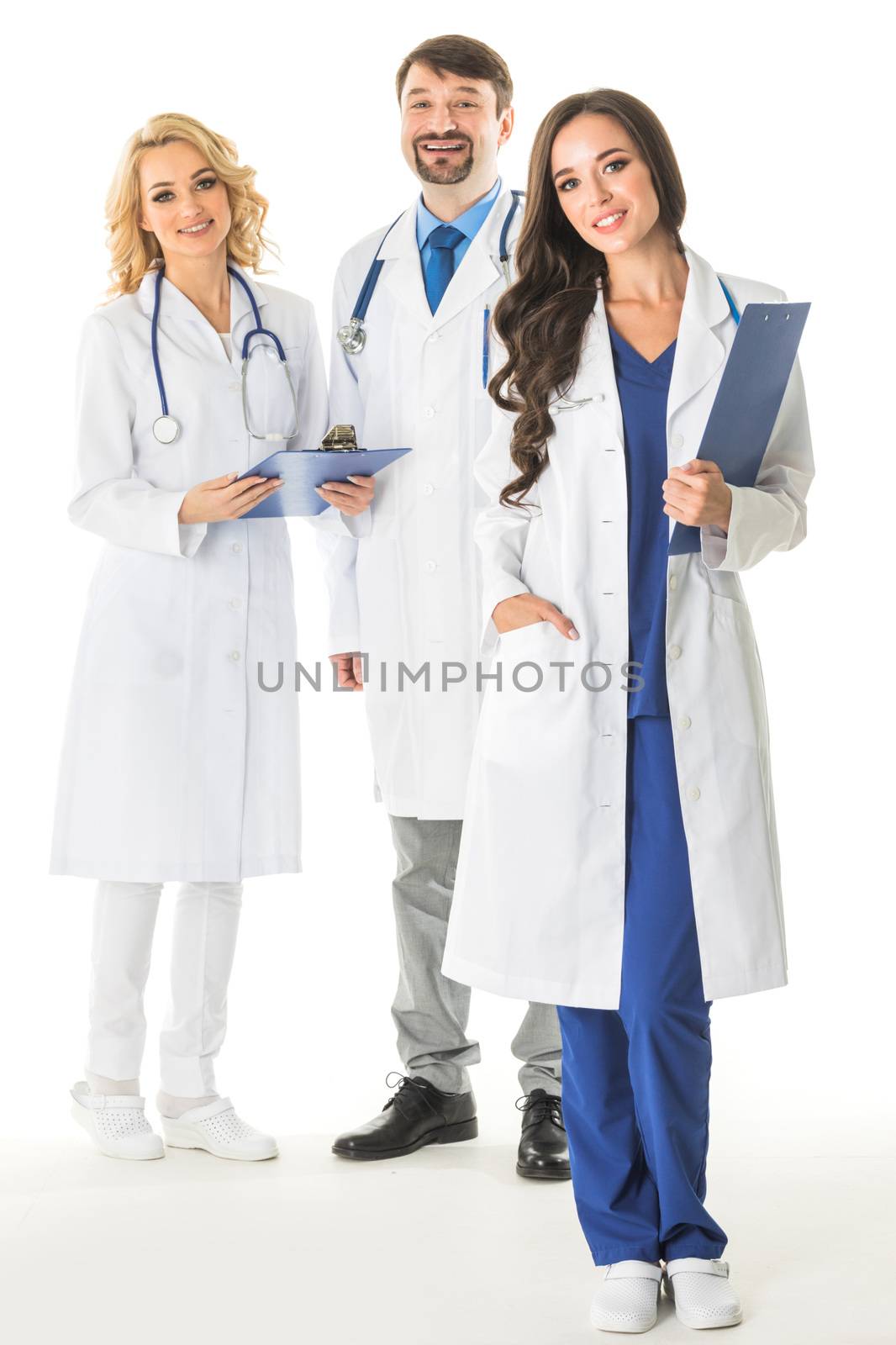 Portrait of confident happy group of doctors isolated on white background