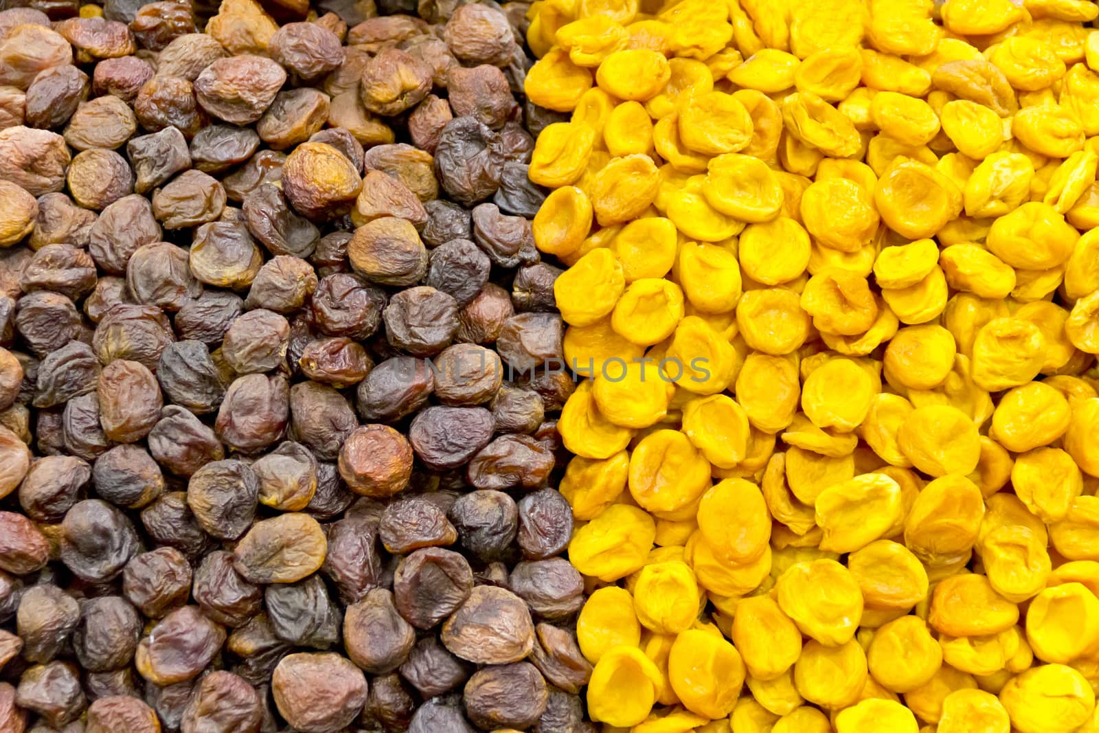 Background from colored oriental dry fruits in marketplace