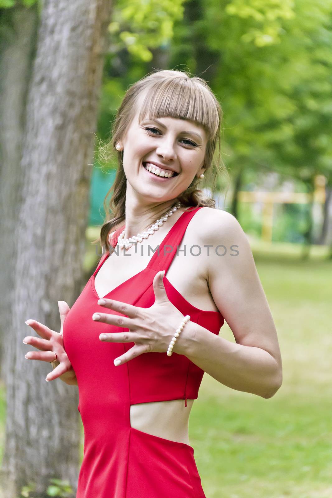 Portrait of beautiful girl with white pearl earring