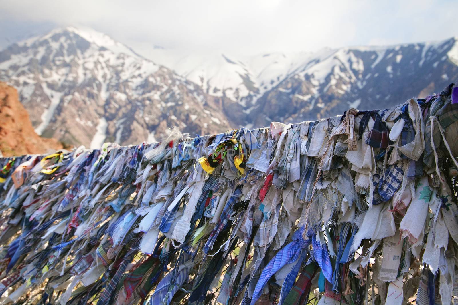 Lots of Buddhist prayer ribbons in Chimgan mountains, Uzbekistan