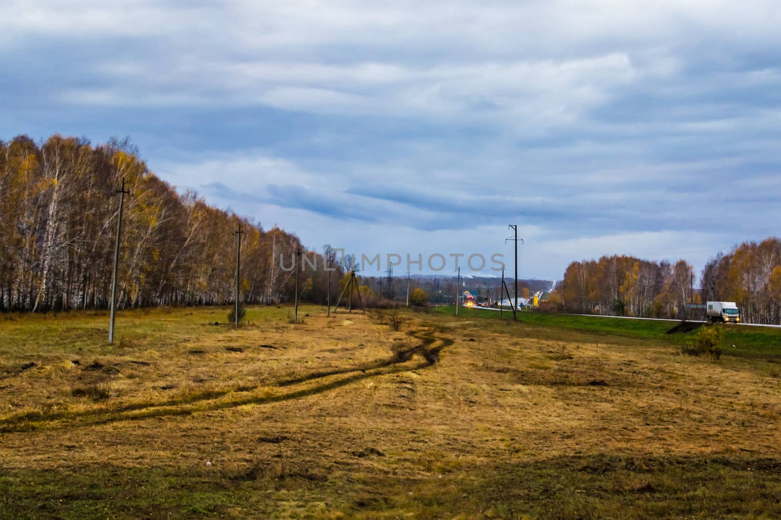 Autumn road home suitcase travel the road in the evening