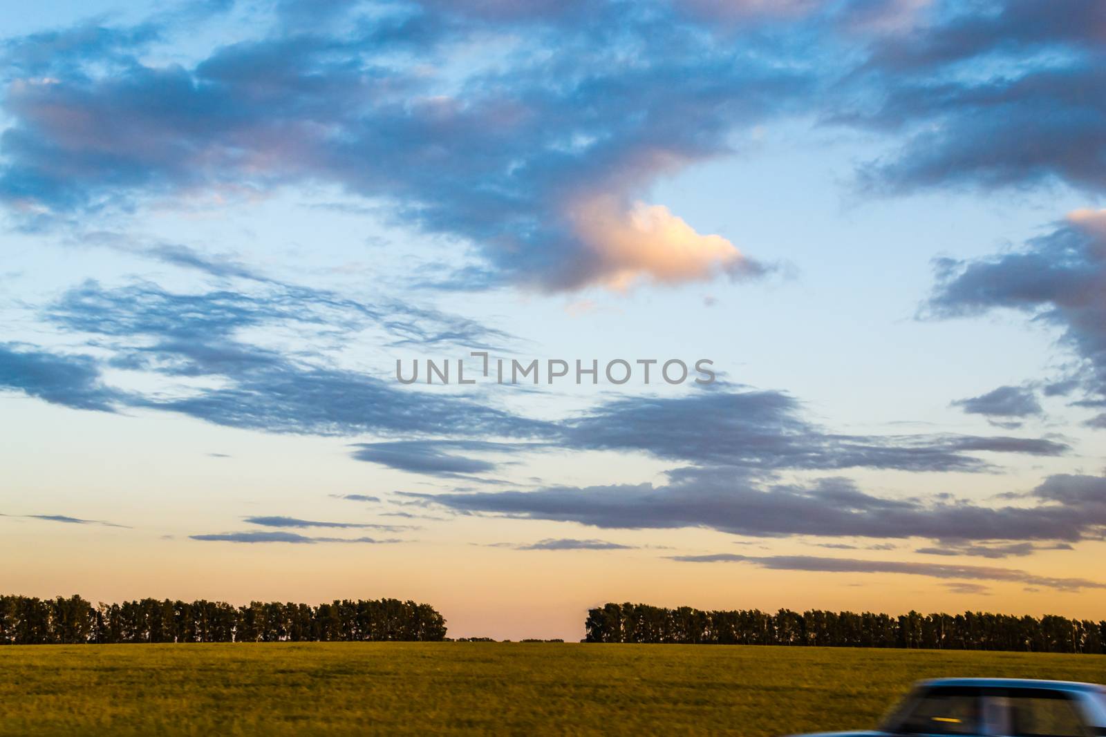 the road going car the evening sky moon night trip