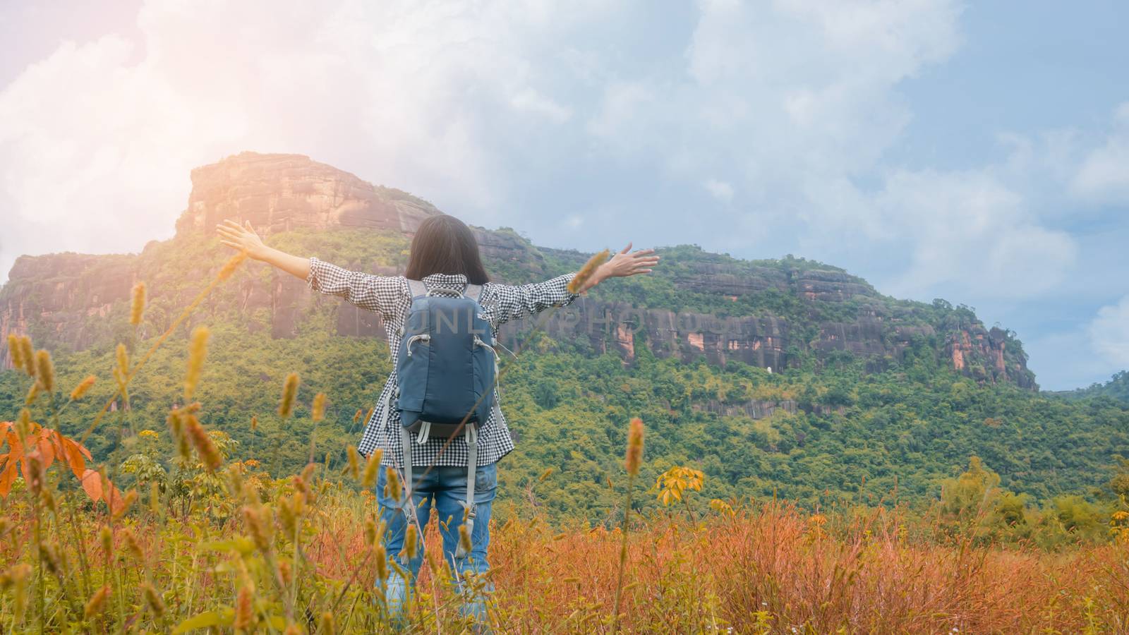 Asian woman backpacker enjoy the view at mountain