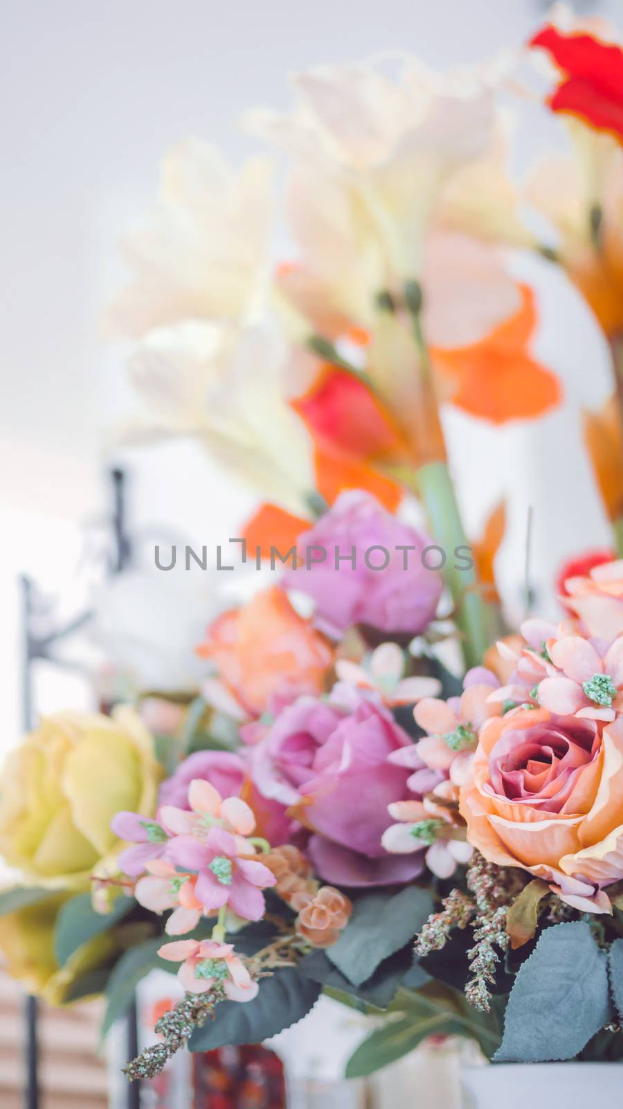 colorful of the plastic flowers bouquet  , soft of focus